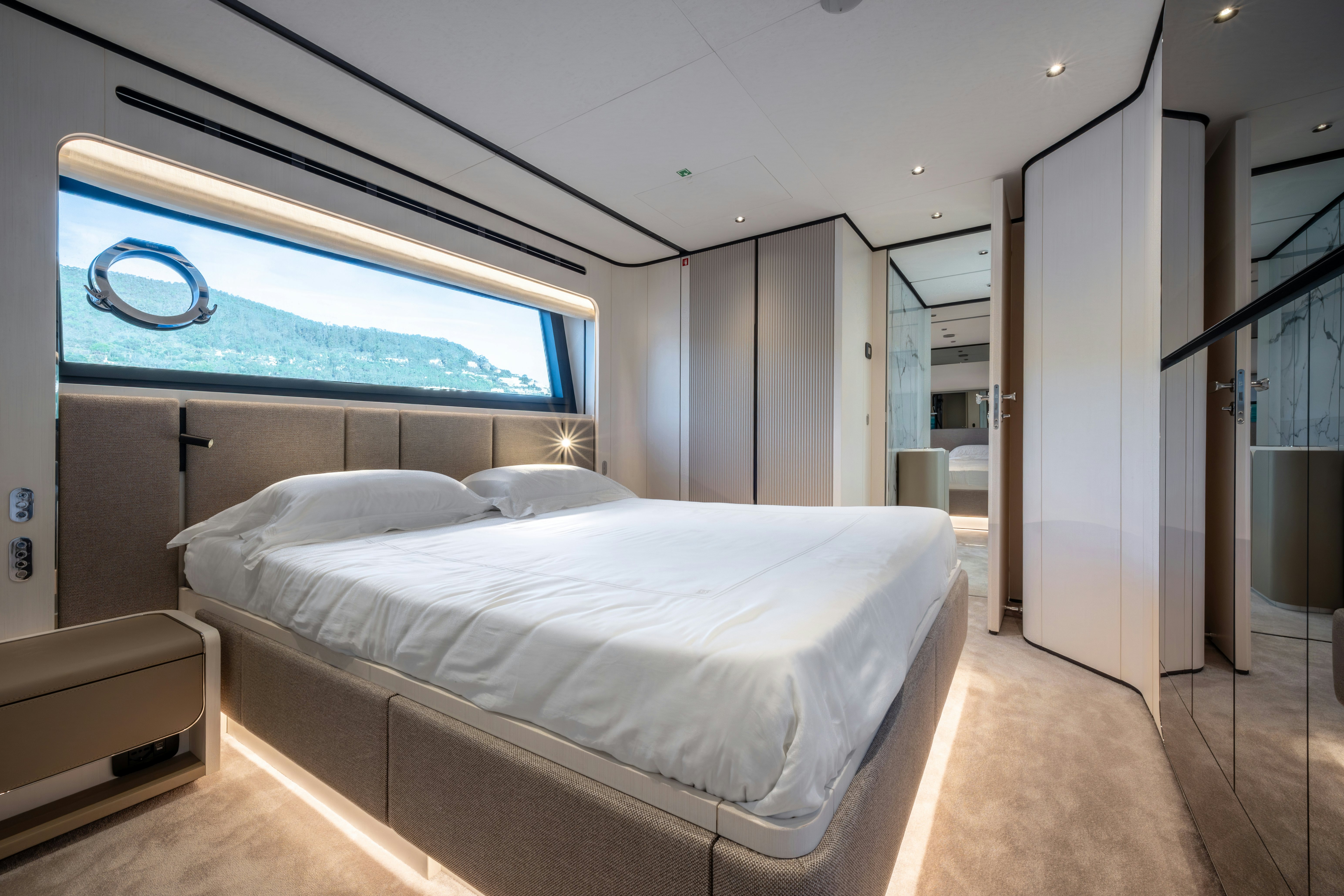 a bedroom with a large bed aboard TOGETHER Yacht for Sale