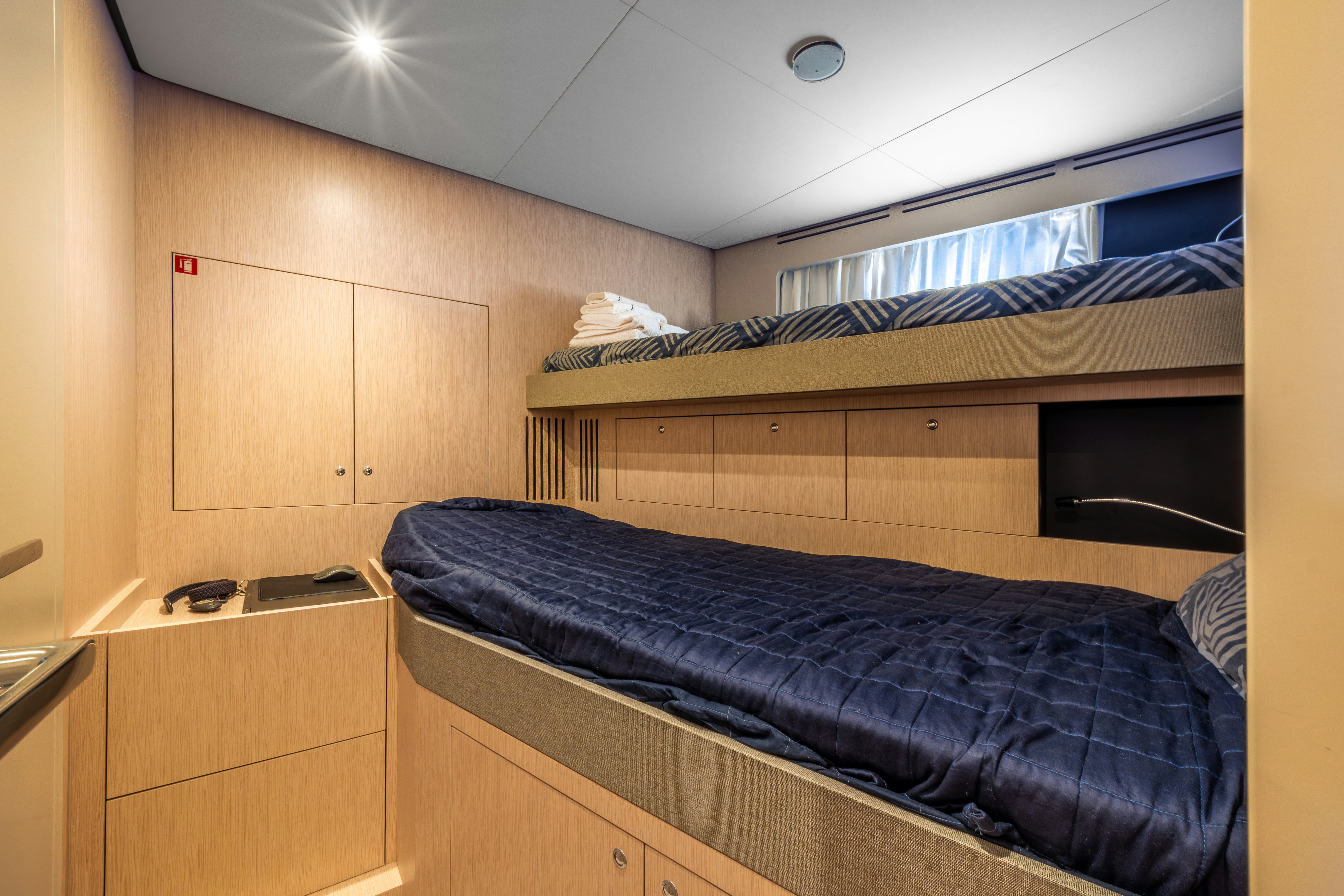 a room with a couch and a desk aboard TOGETHER Yacht for Sale