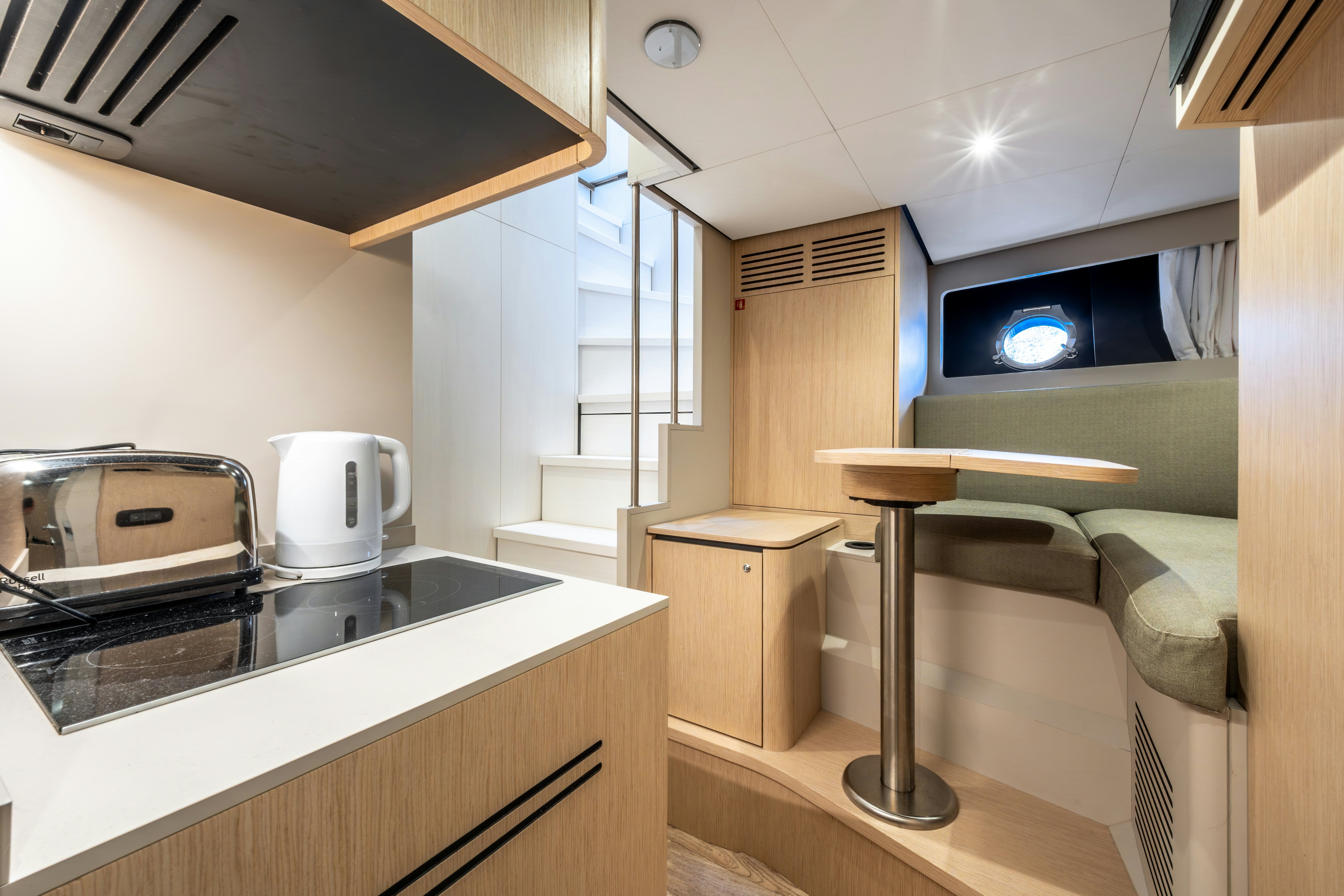 a kitchen with a stove and a coffee maker aboard TOGETHER Yacht for Sale