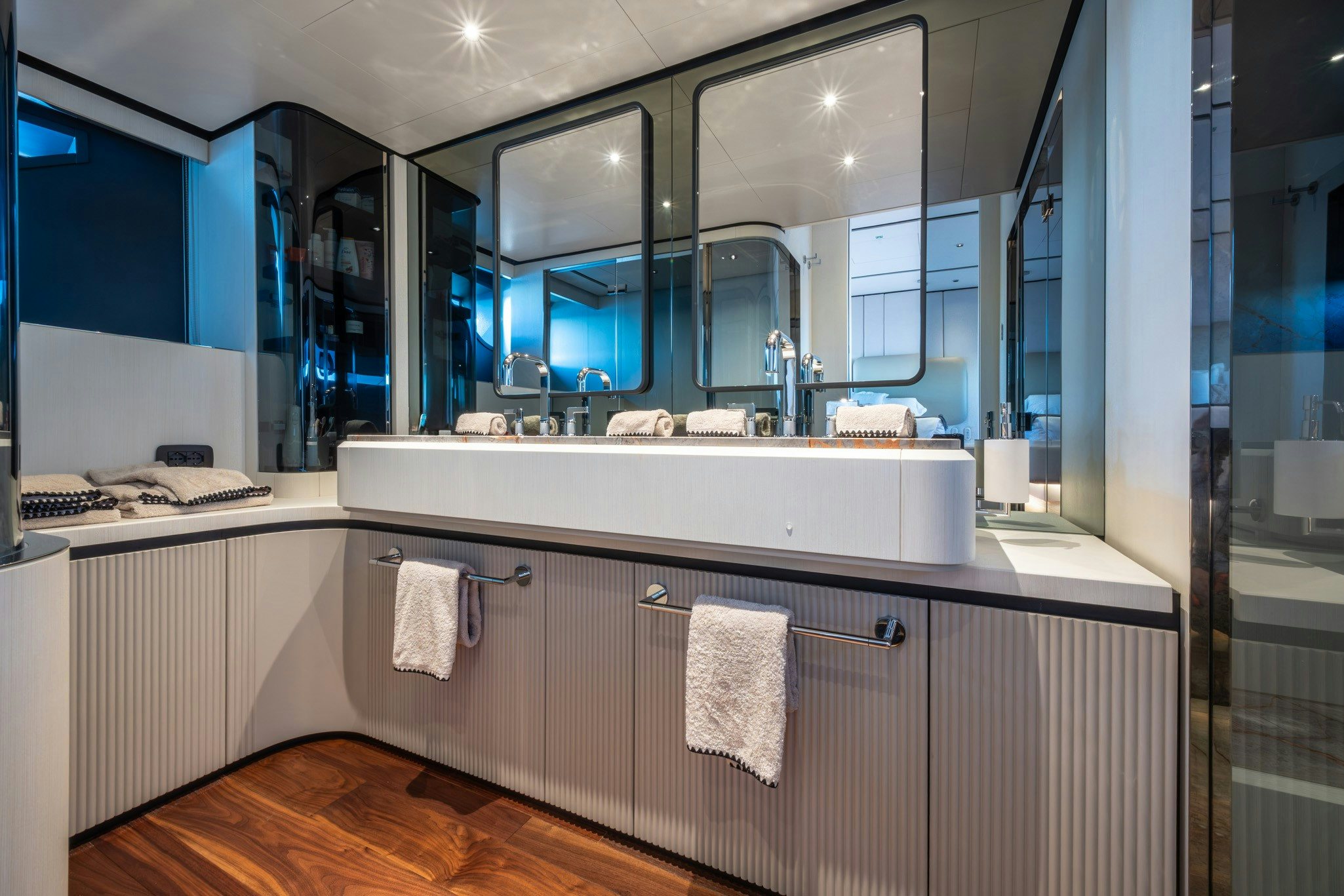a bathroom with a large mirror aboard TOGETHER Yacht for Charter