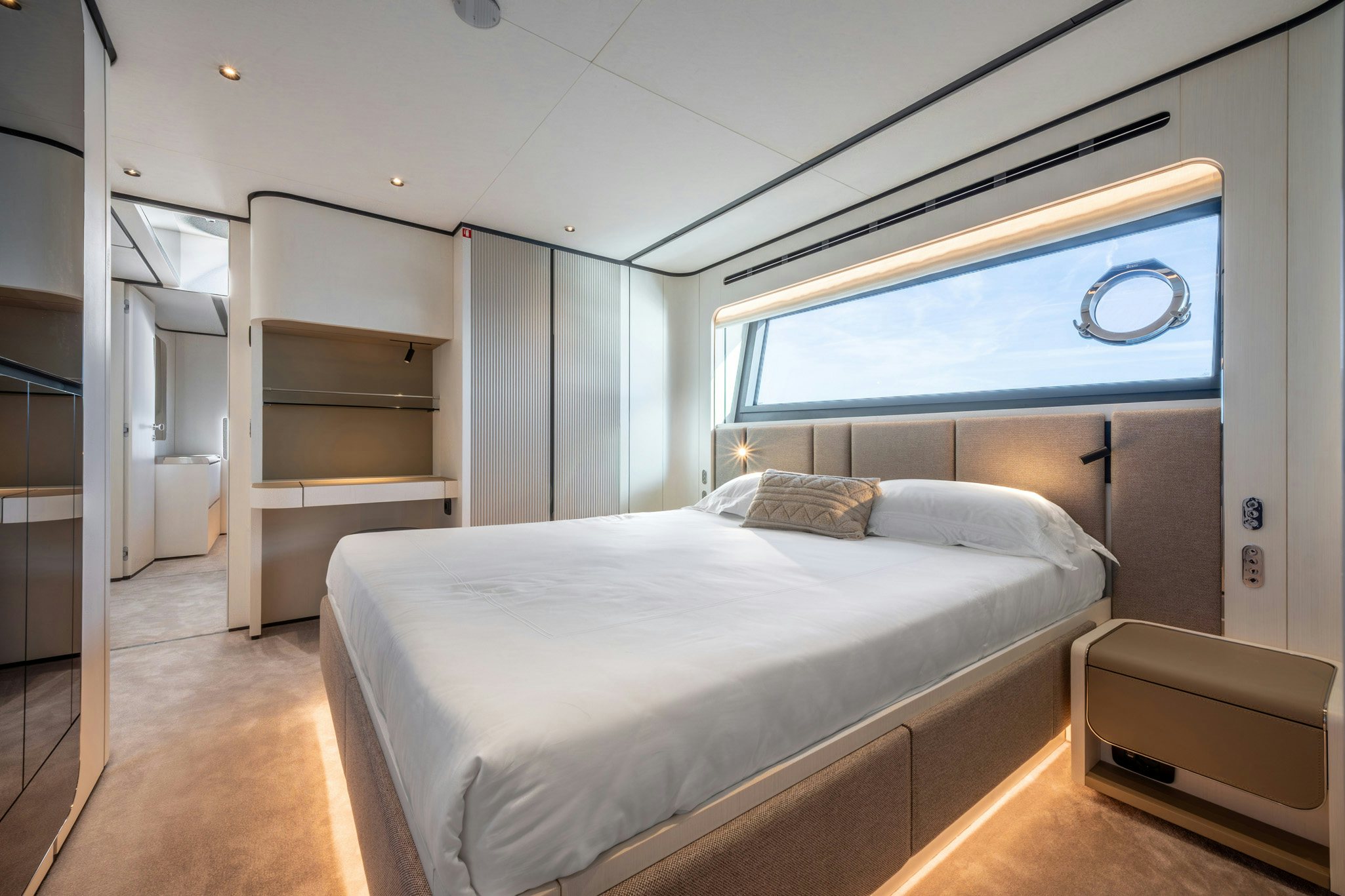 a room with a bed and a shelf aboard TOGETHER Yacht for Charter