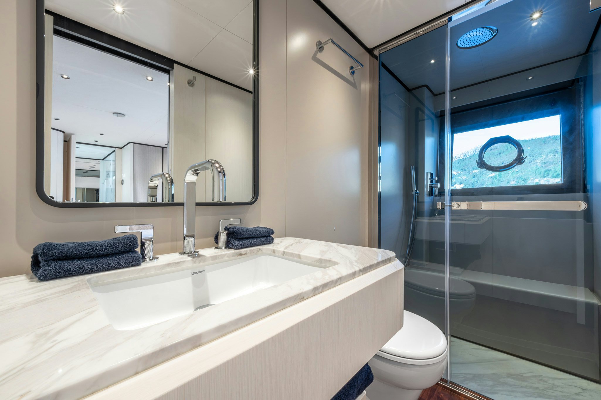 a bathroom with a glass shower aboard TOGETHER Yacht for Charter