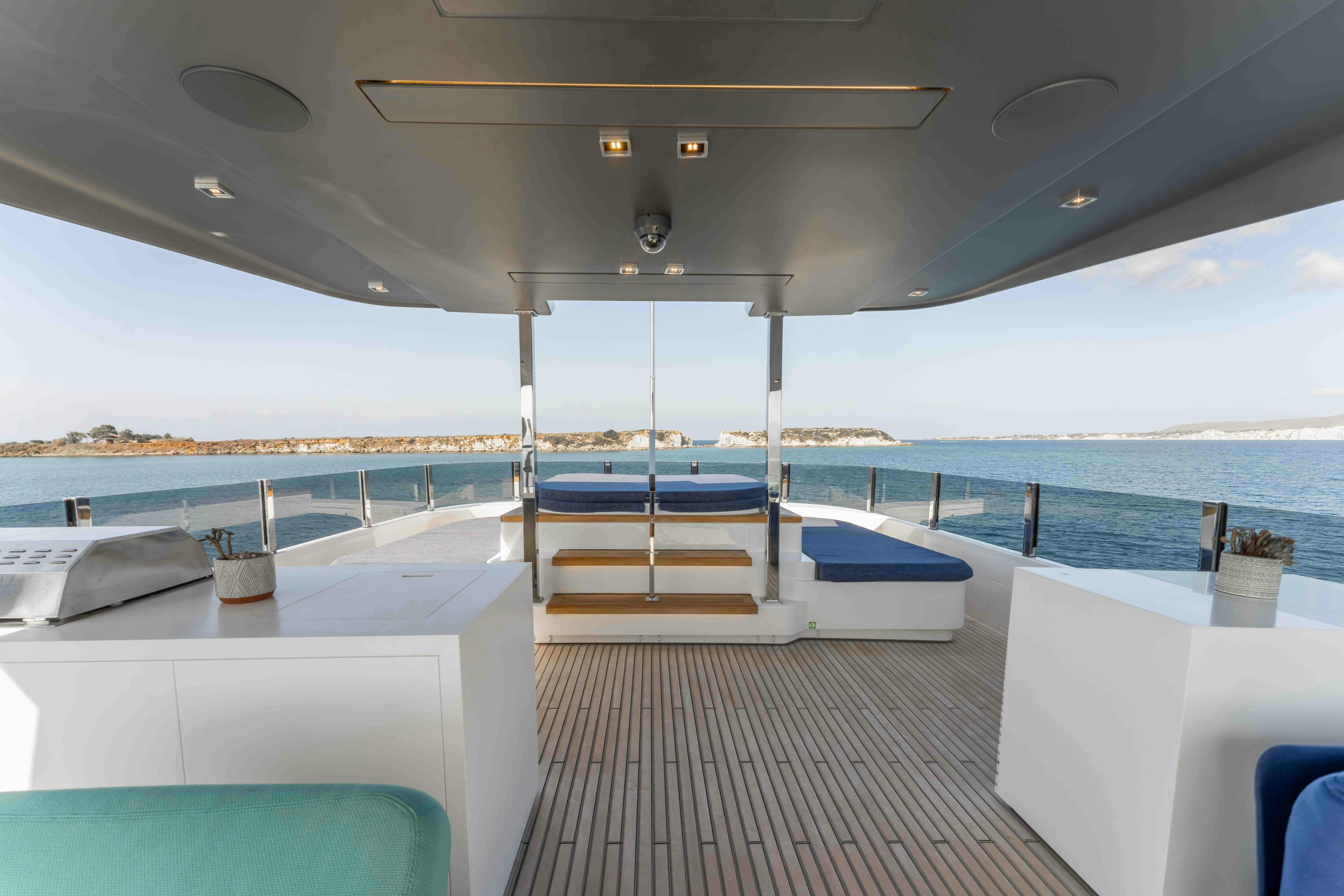 a room with a table and chairs aboard RENEWAL 3 Yacht for Sale