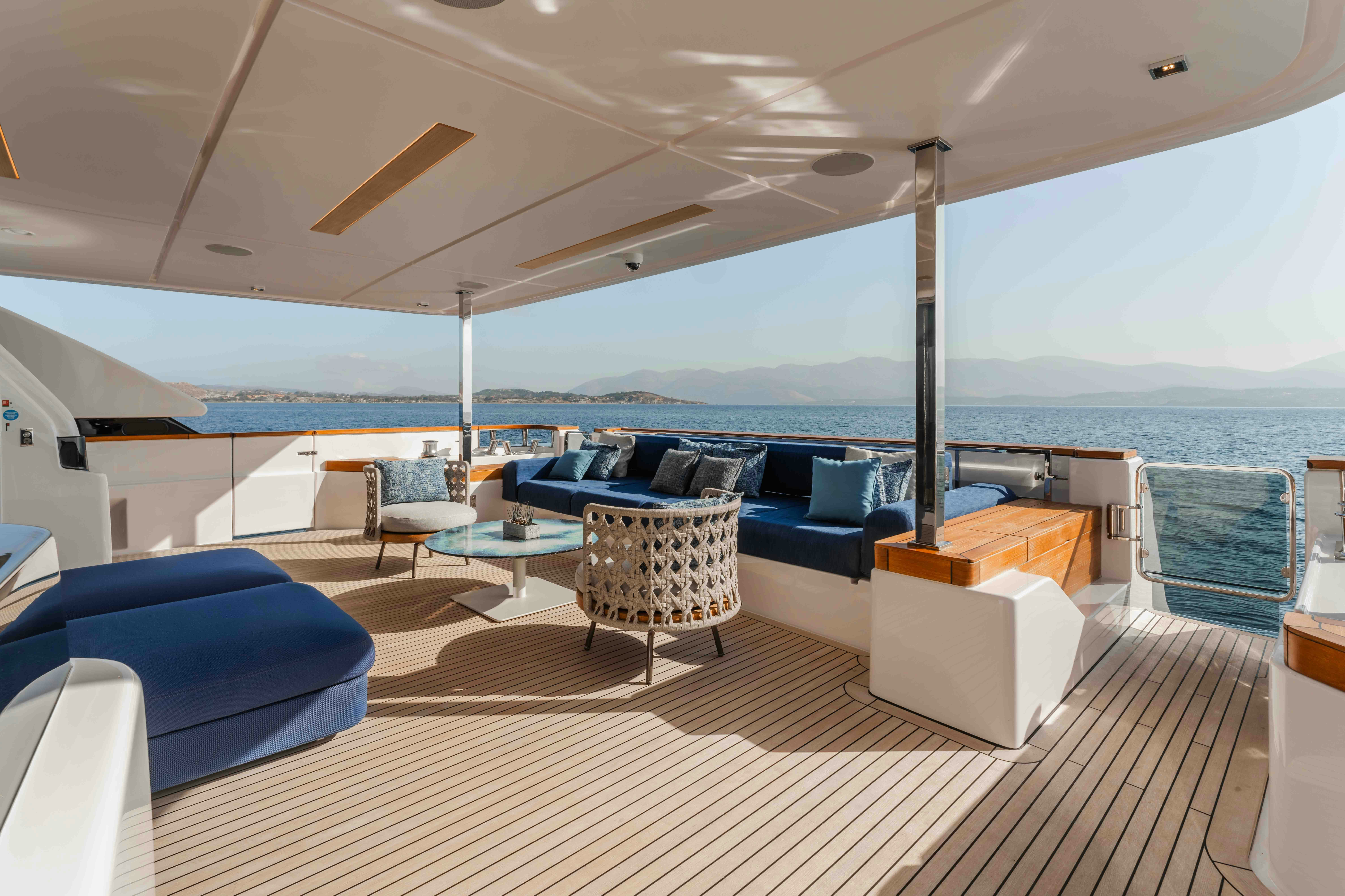a large living room with a large balcony aboard RENEWAL 3 Yacht for Sale