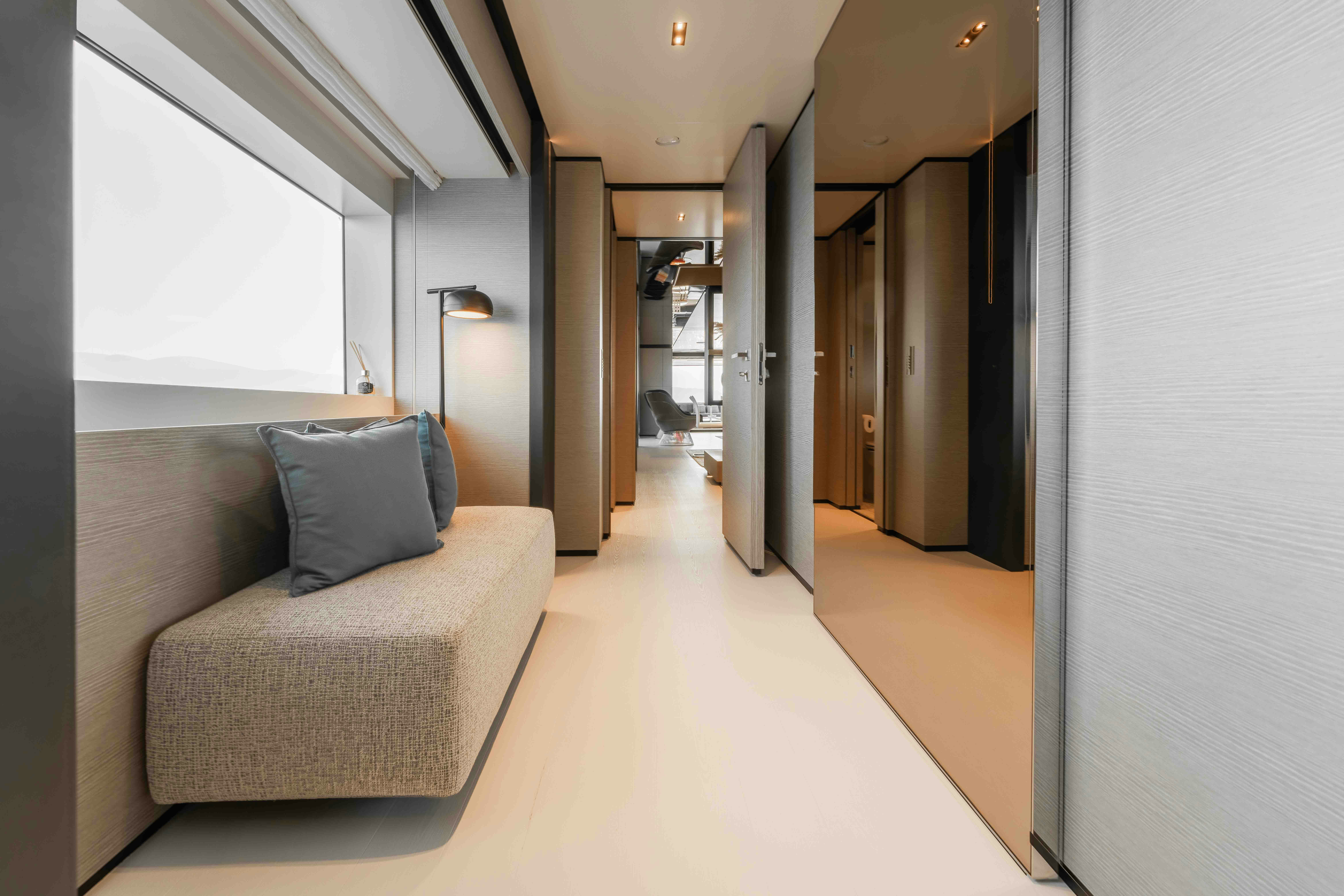 a couch in a room aboard RENEWAL 3 Yacht for Sale