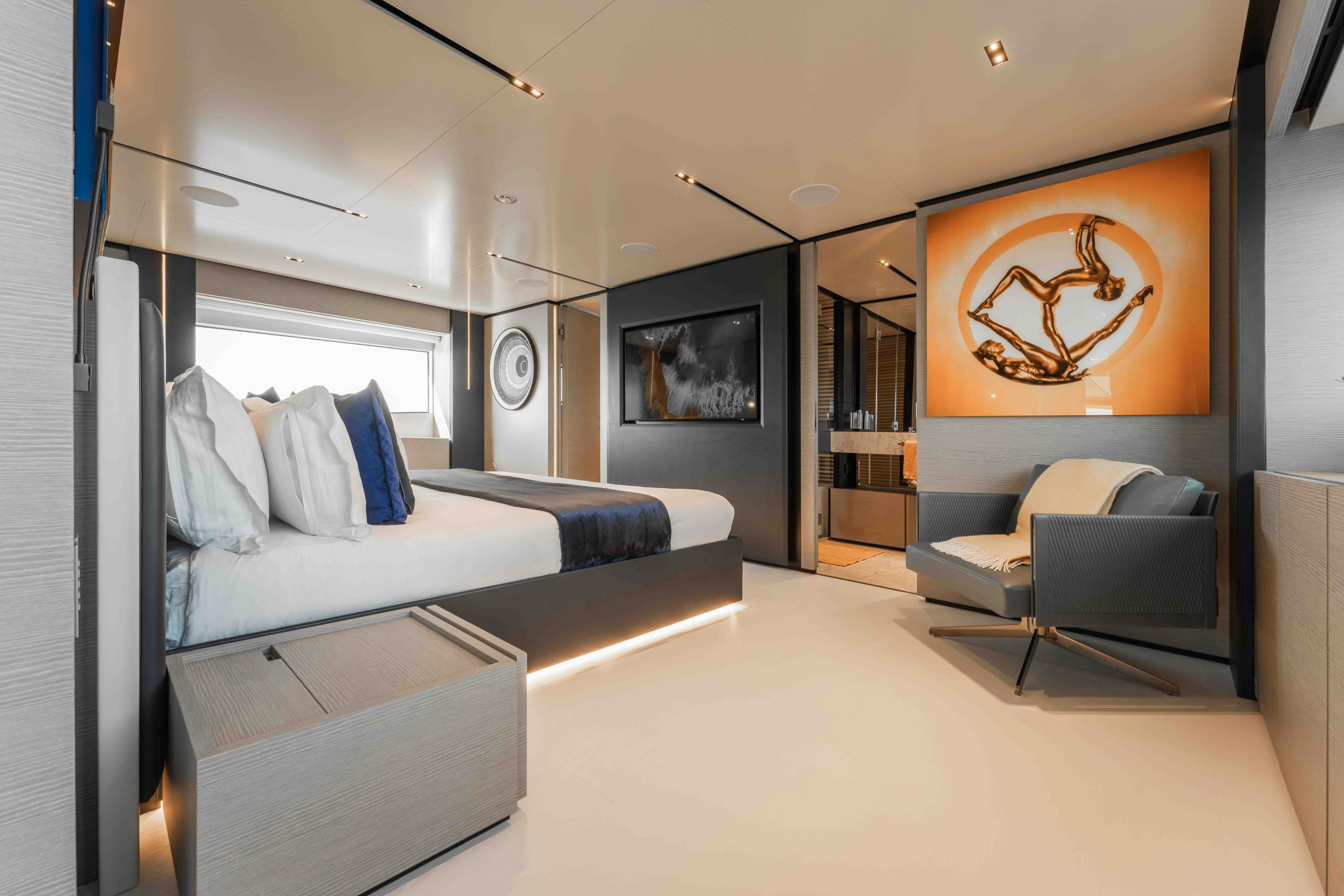 a modern looking bedroom aboard RENEWAL 3 Yacht for Sale