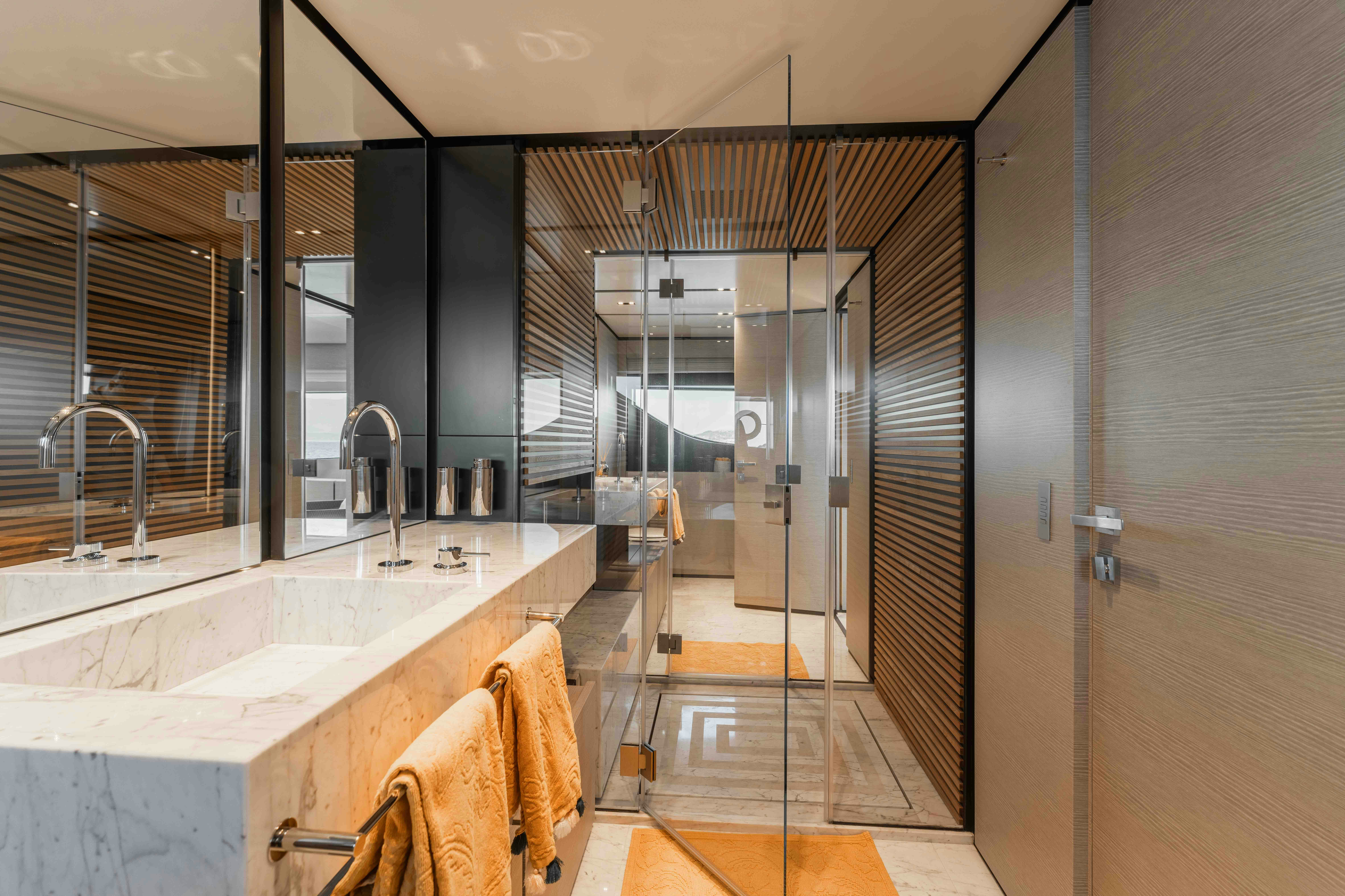 a bathroom with a sink and a shower aboard RENEWAL 3 Yacht for Sale