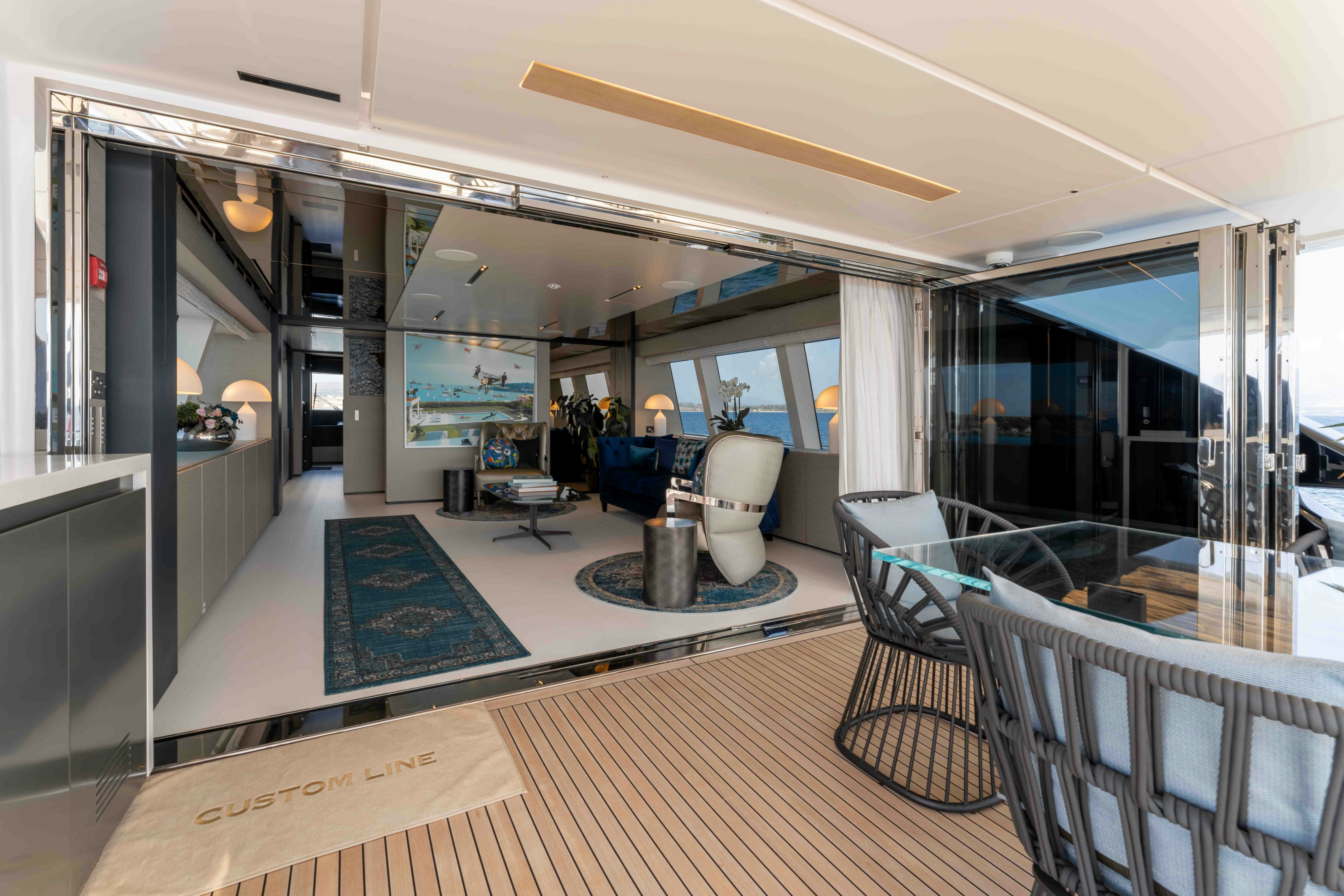 a modern looking bathroom with a large glass shower aboard RENEWAL 3 Yacht for Sale