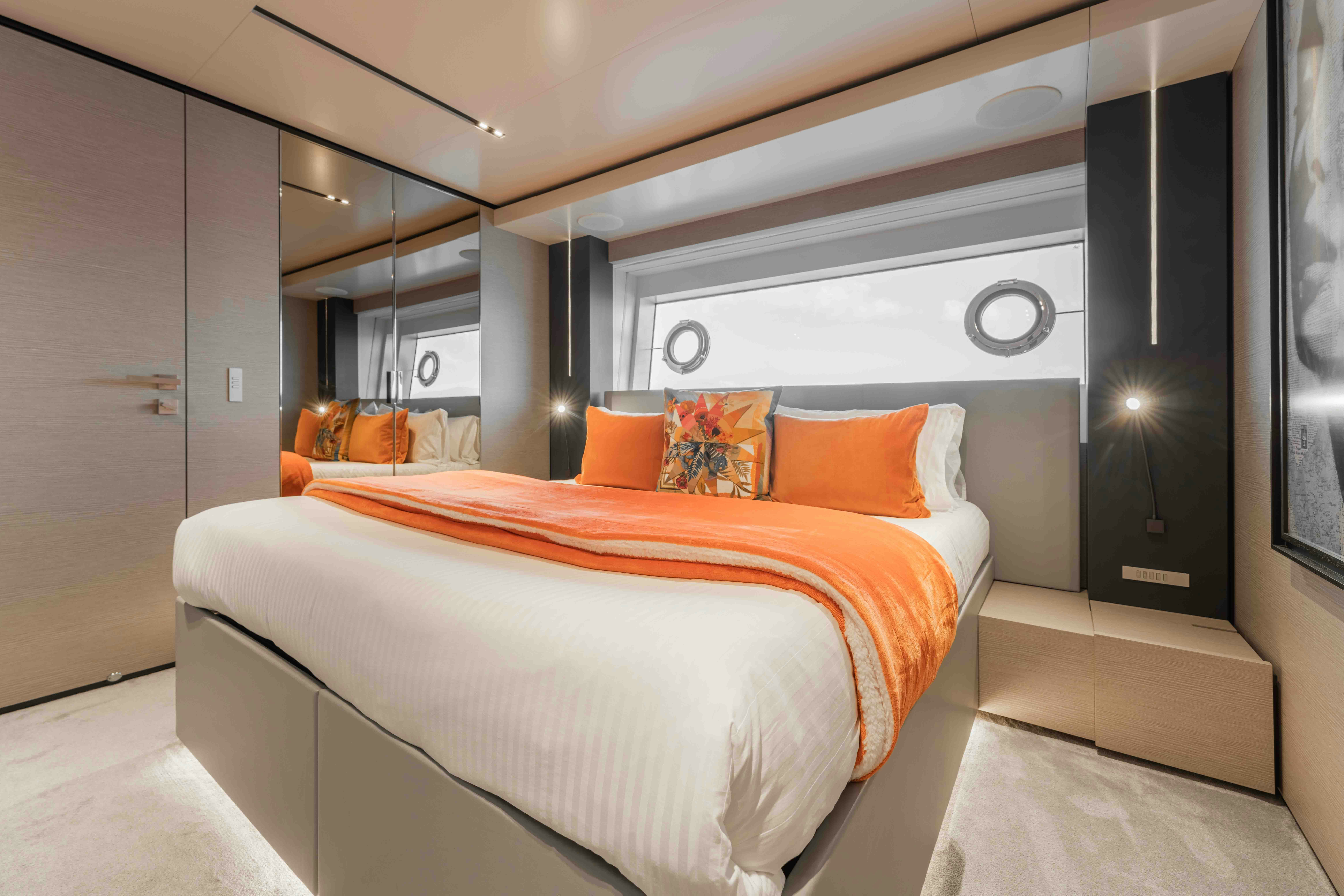 a bed in a room aboard RENEWAL 3 Yacht for Sale