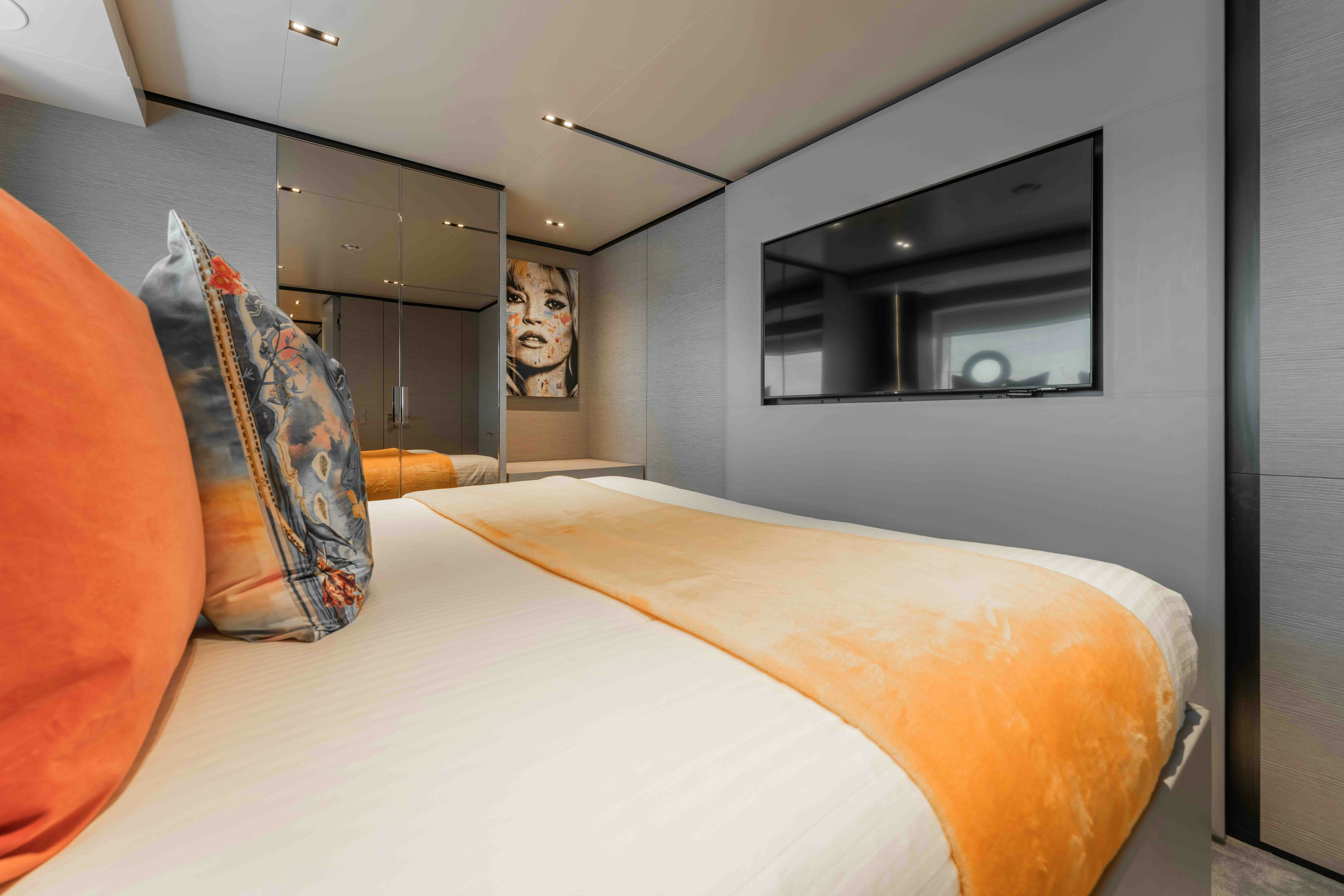 a bed with a pillow and a pillow on it aboard RENEWAL 3 Yacht for Sale