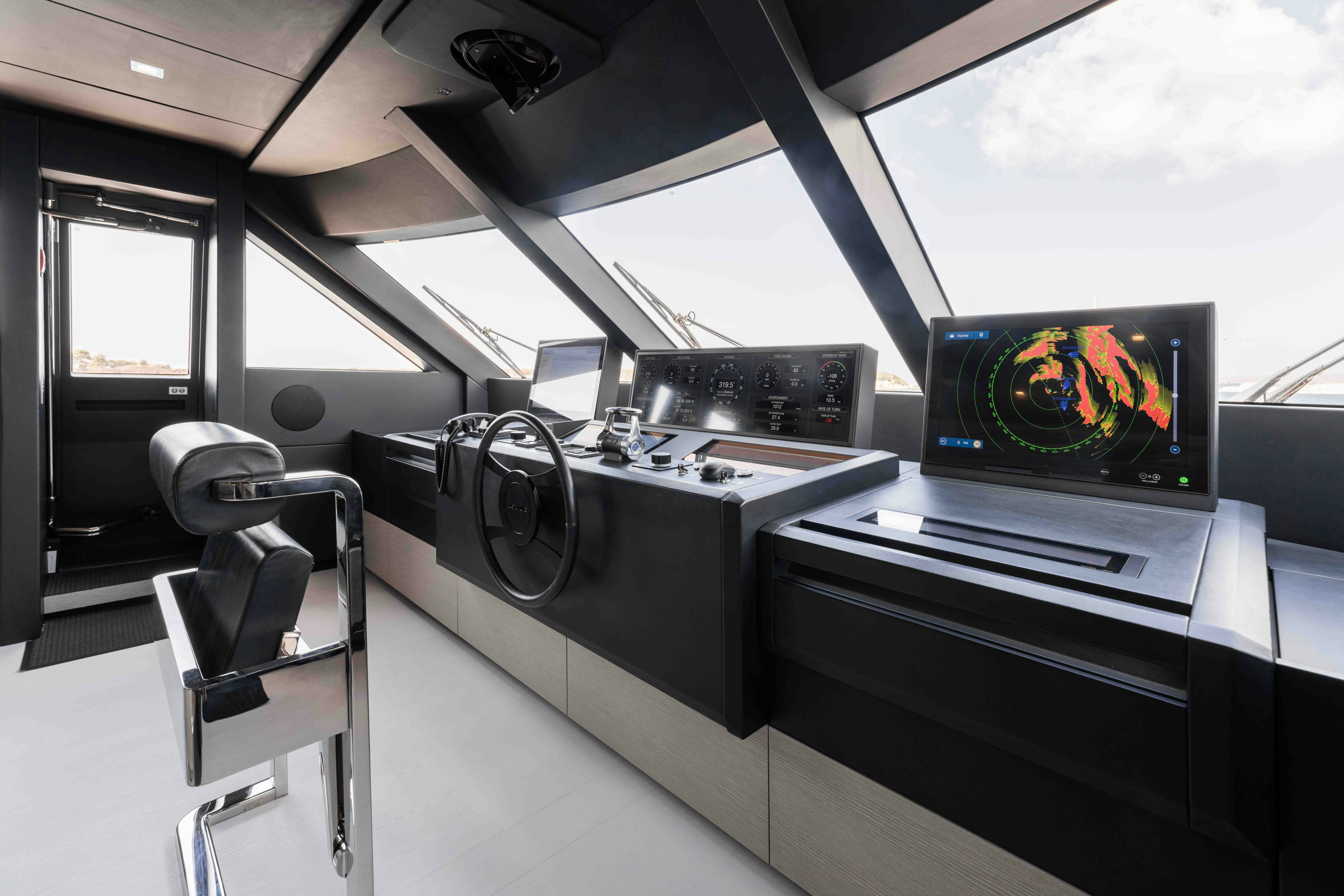 a room with a tv and a computer aboard RENEWAL 3 Yacht for Sale