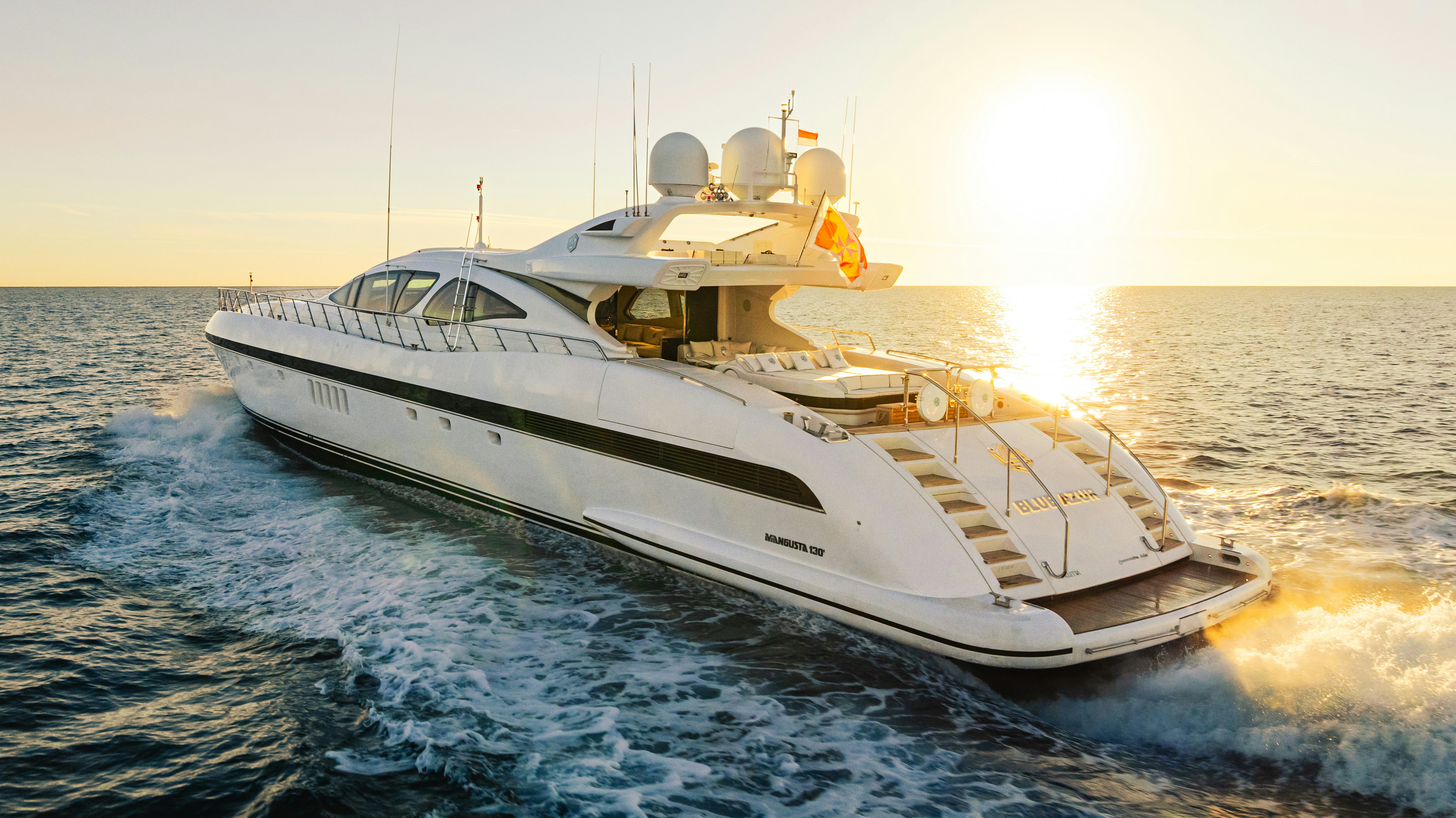 a large white boat on the water aboard BLUE AZUR Yacht for Sale