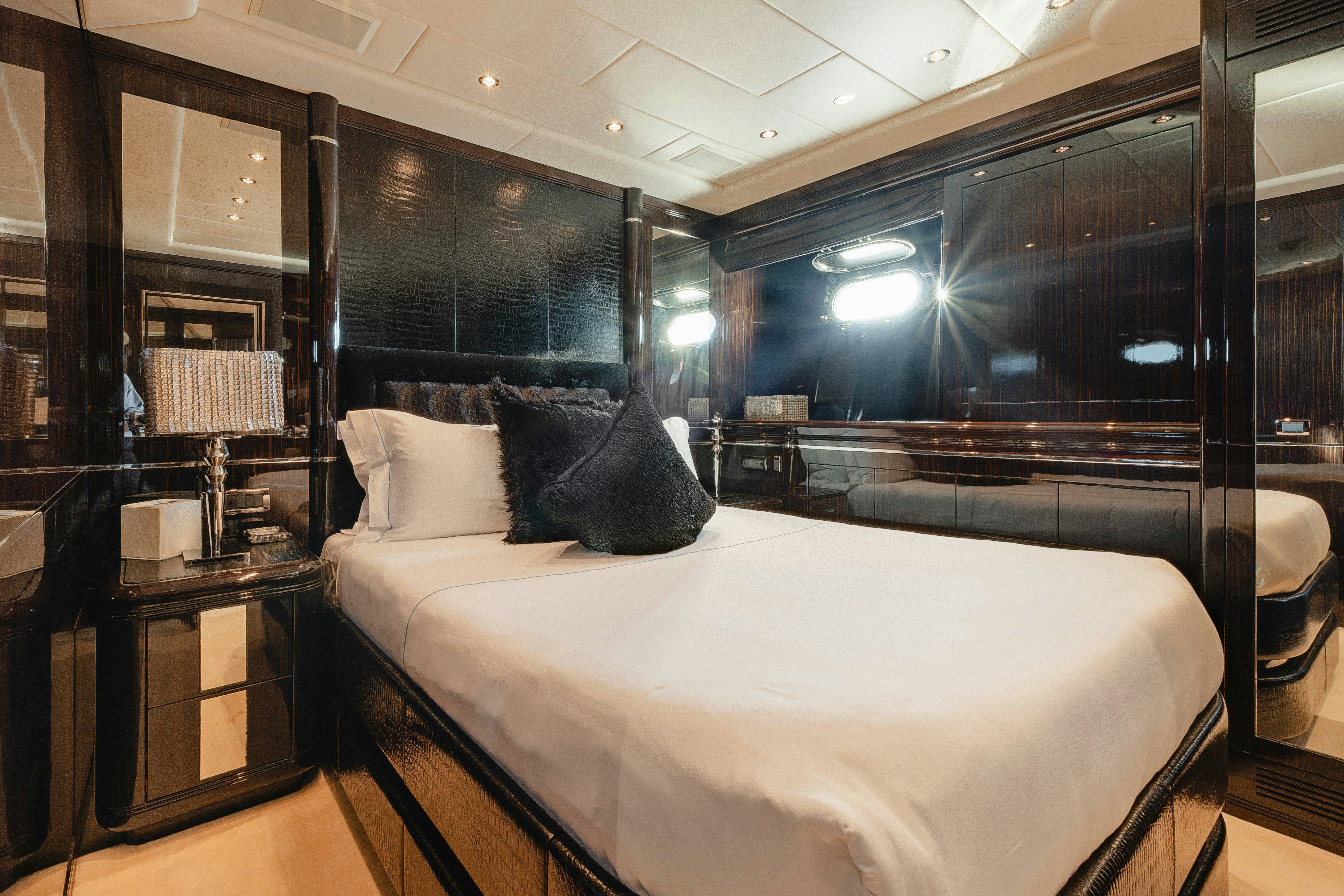 a bed in a room aboard BLUE AZUR Yacht for Sale