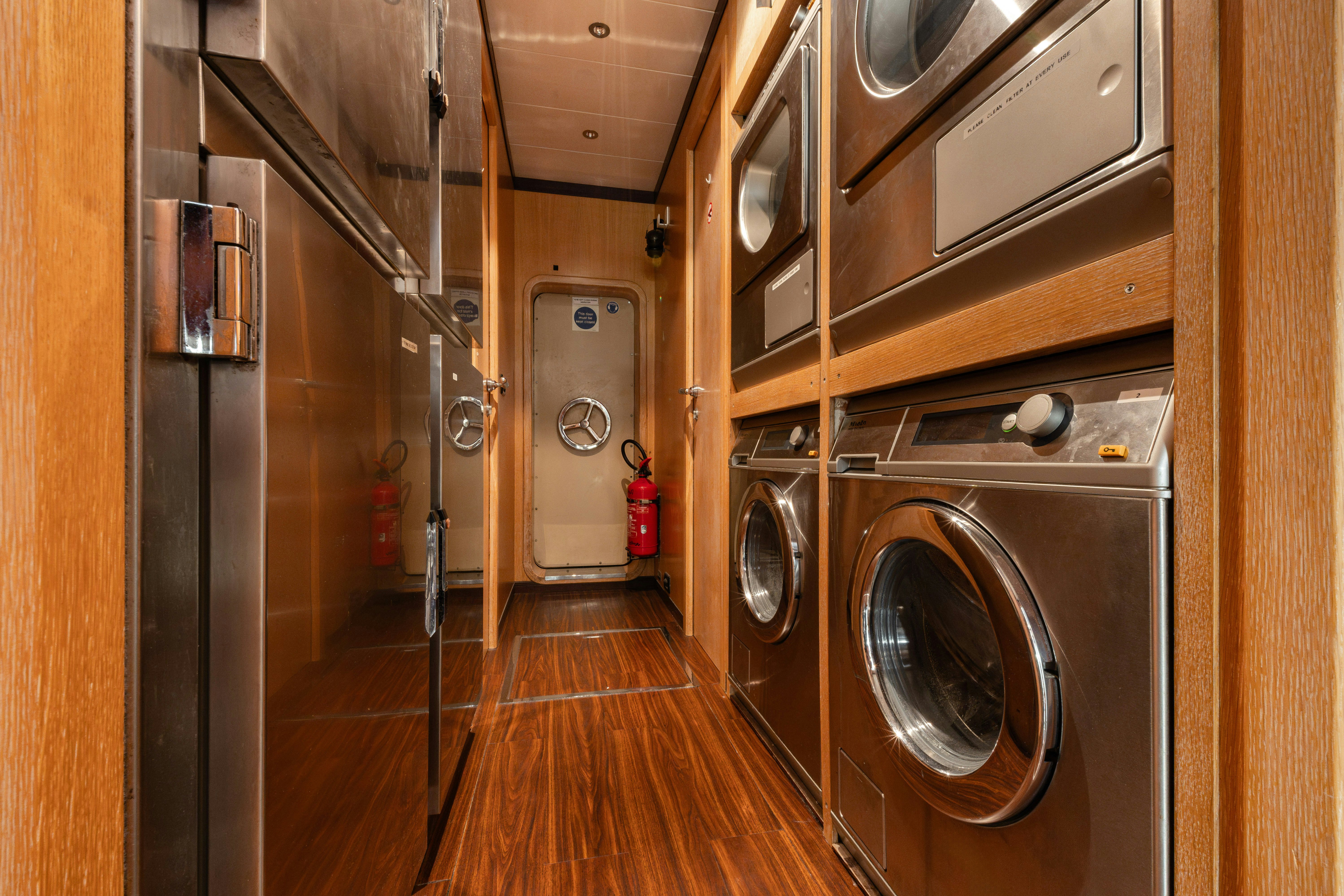 a room with a washer and dryer aboard BLUE AZUR Yacht for Sale