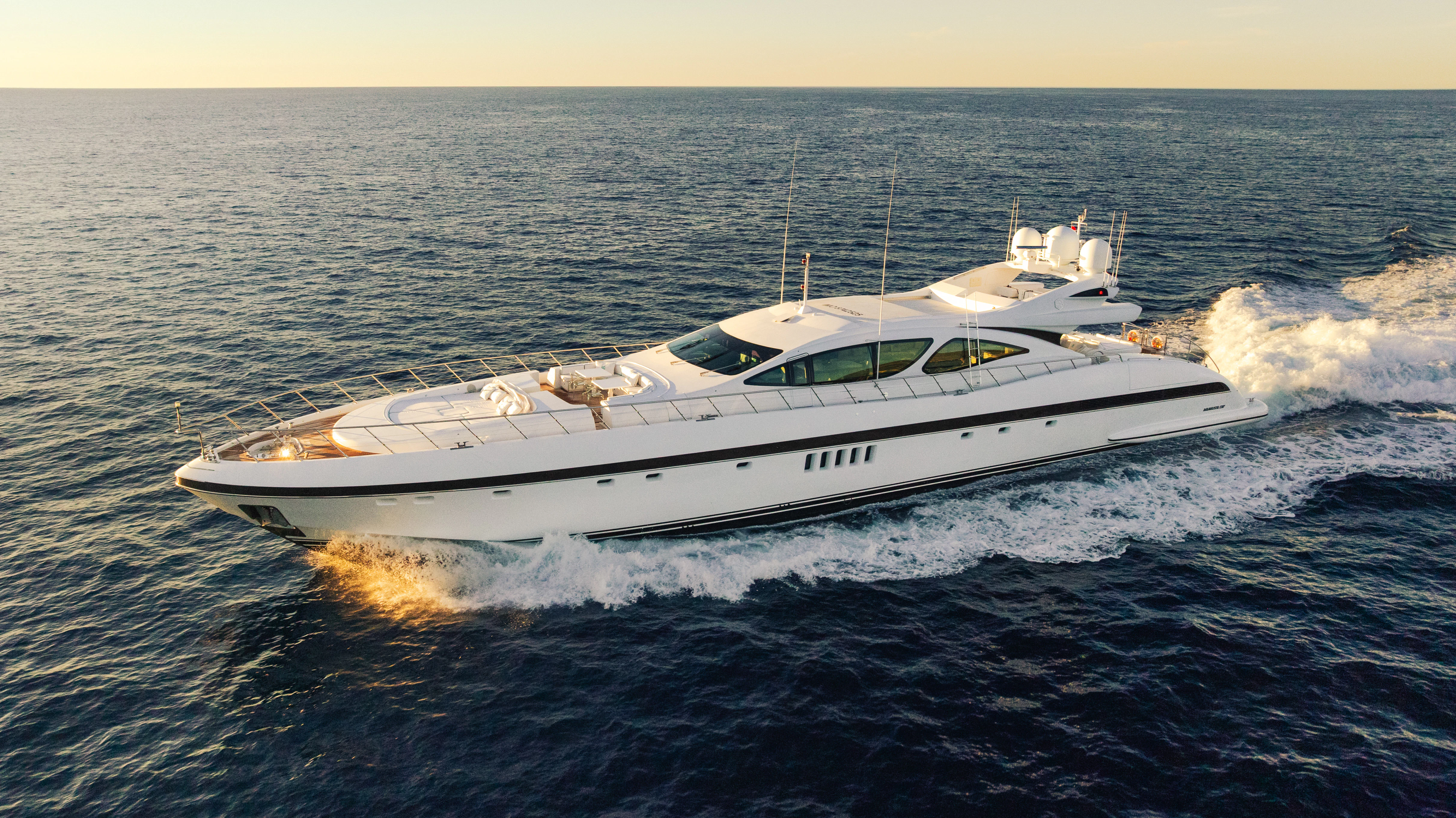 a white yacht on the water aboard BLUE AZUR Yacht for Charter