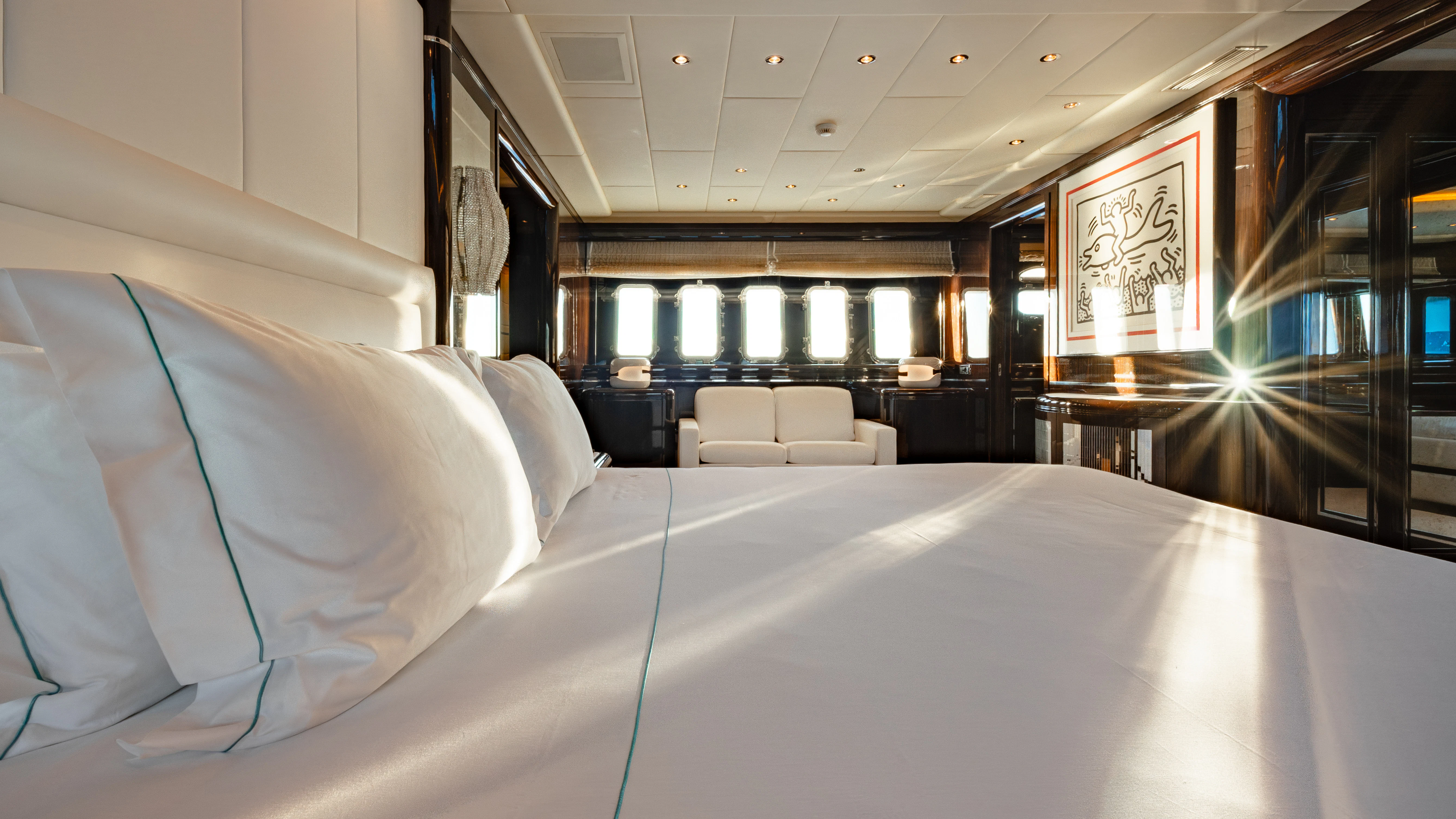 a large bed in a room aboard BLUE AZUR Yacht for Charter