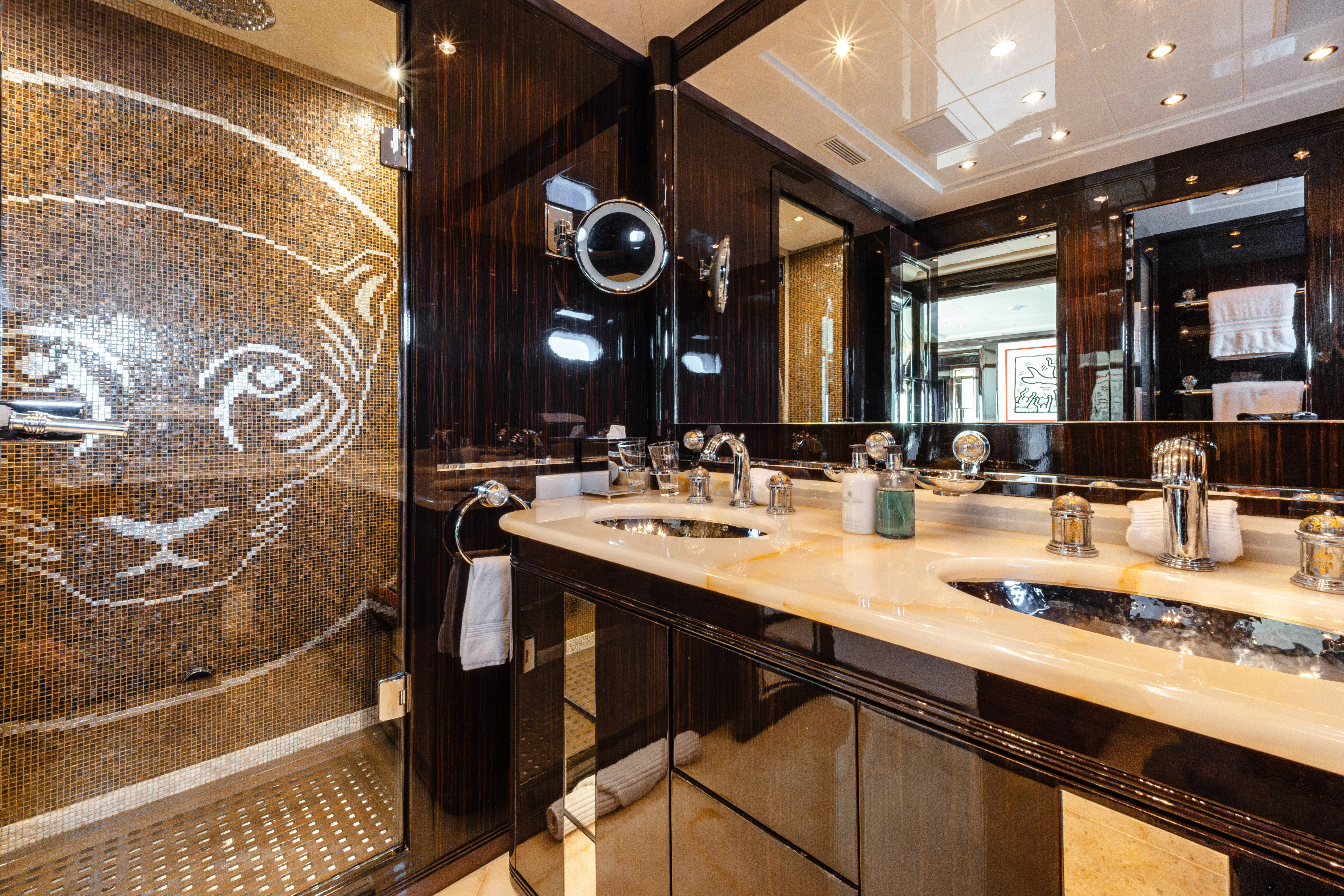 a bathroom with a large mirror aboard BLUE AZUR Yacht for Charter