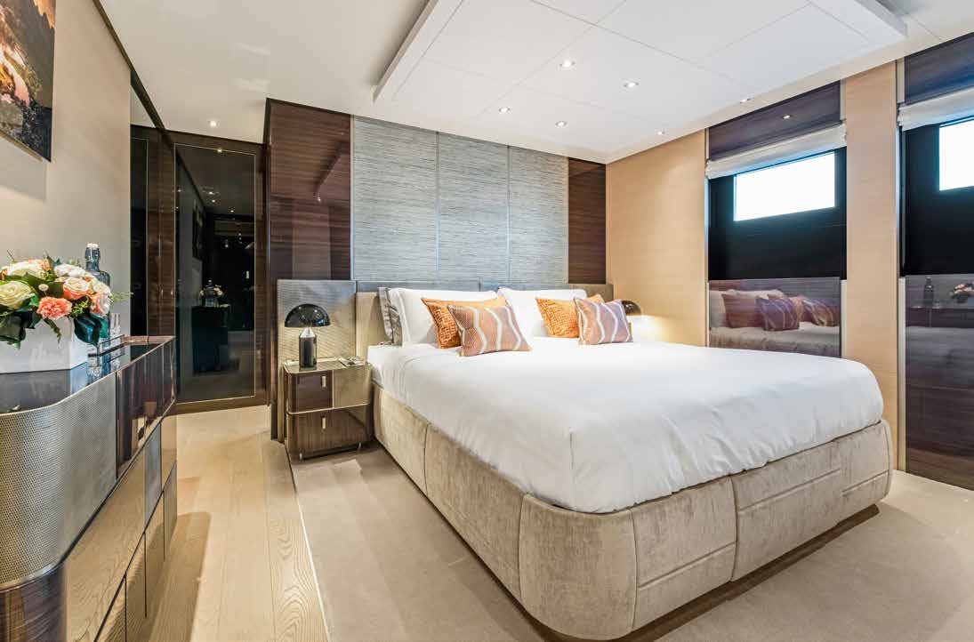 a large bed in a room aboard NURI Yacht for Charter
