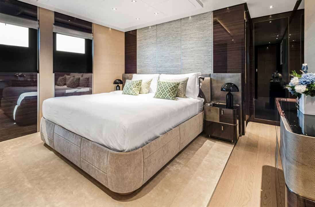 a large bed in a room aboard NURI Yacht for Charter