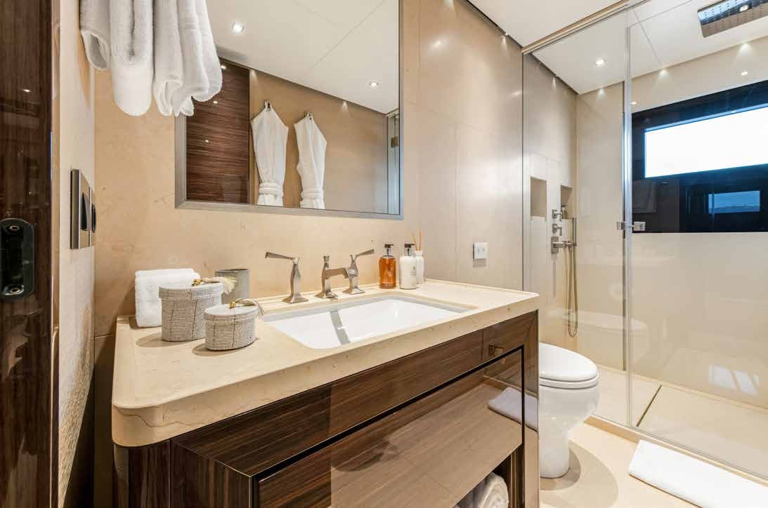 a bathroom with a sink and a mirror aboard NURI Yacht for Charter