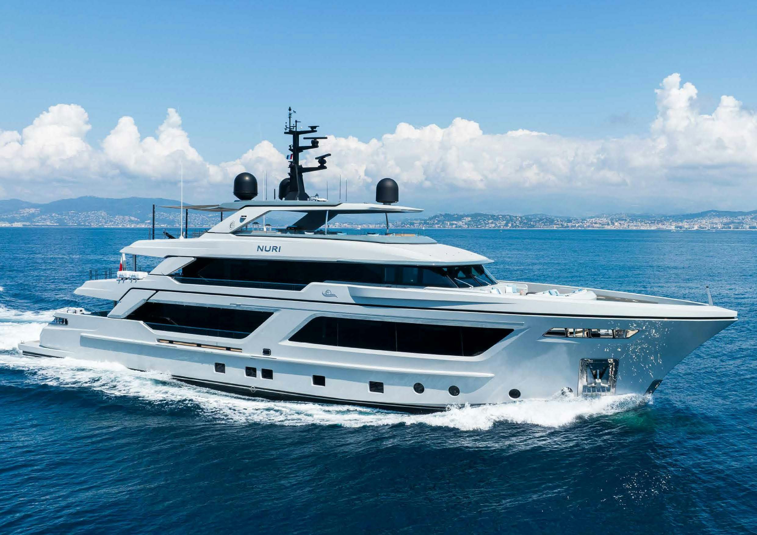 a white yacht in the water aboard NURI Yacht for Charter