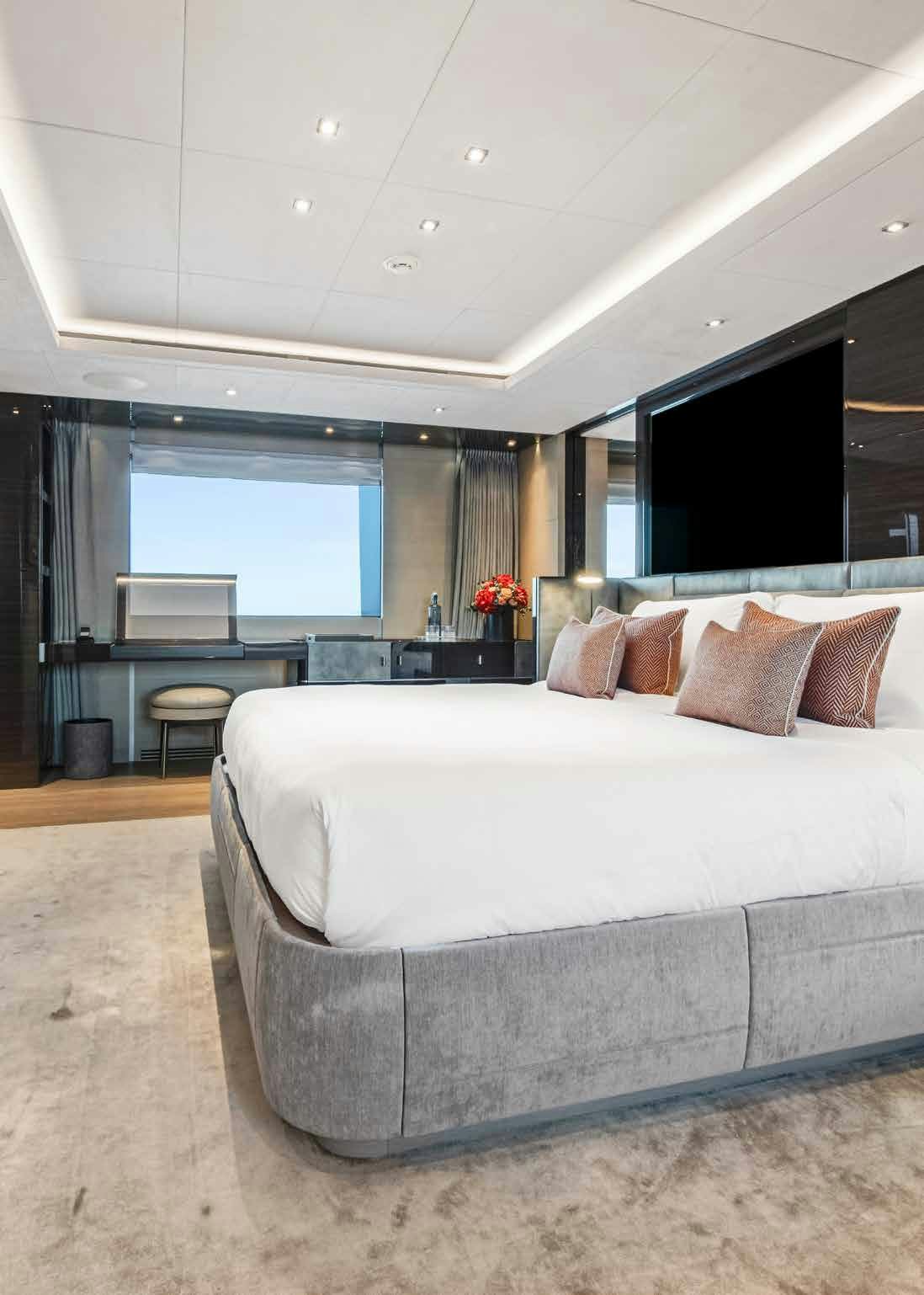 a large bed in a room aboard NURI Yacht for Charter