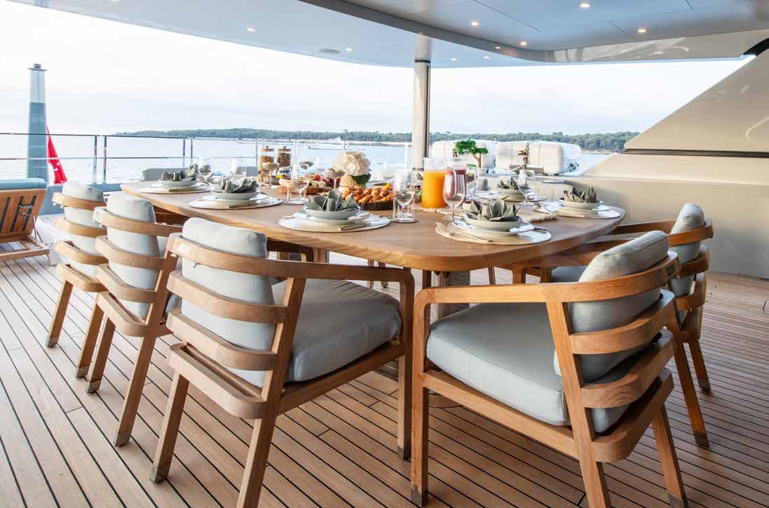 a table set for a meal aboard NURI Yacht for Charter