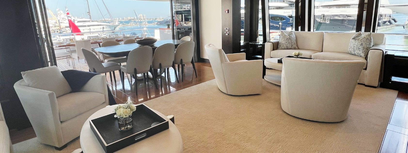 a room with a couch and chairs aboard SPORT Yacht for Charter