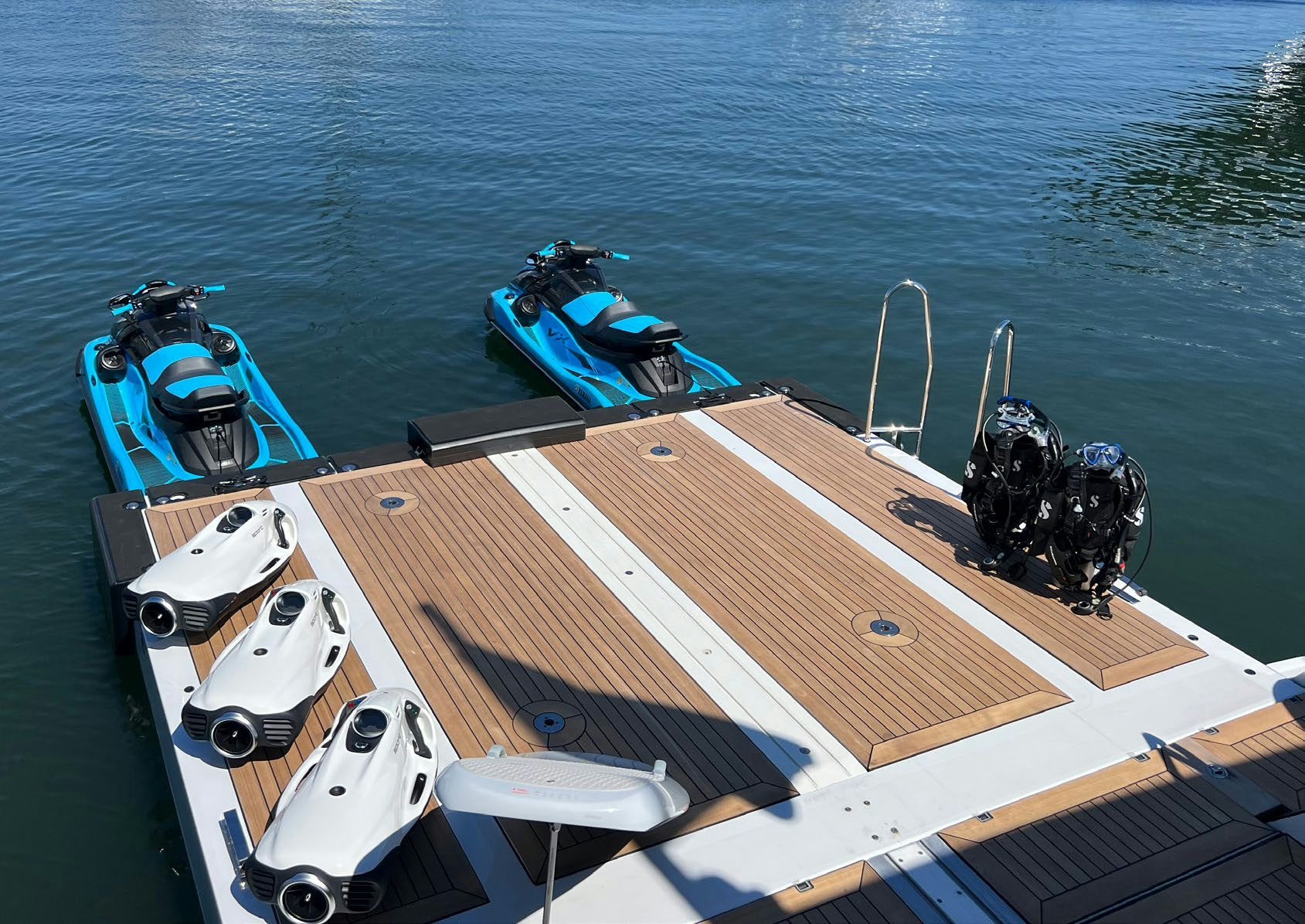 a boat with a motor attached to it aboard SPORT Yacht for Charter