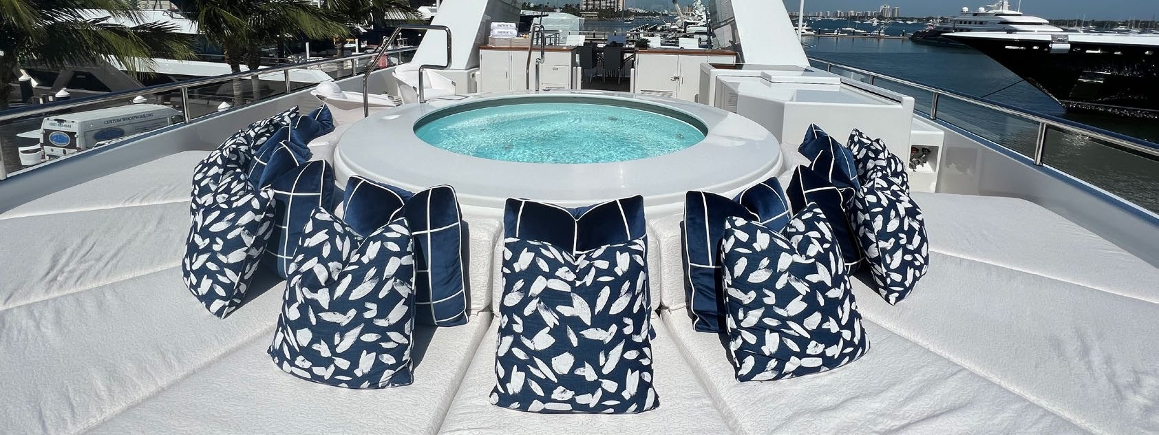 a table with chairs on it aboard SPORT Yacht for Charter