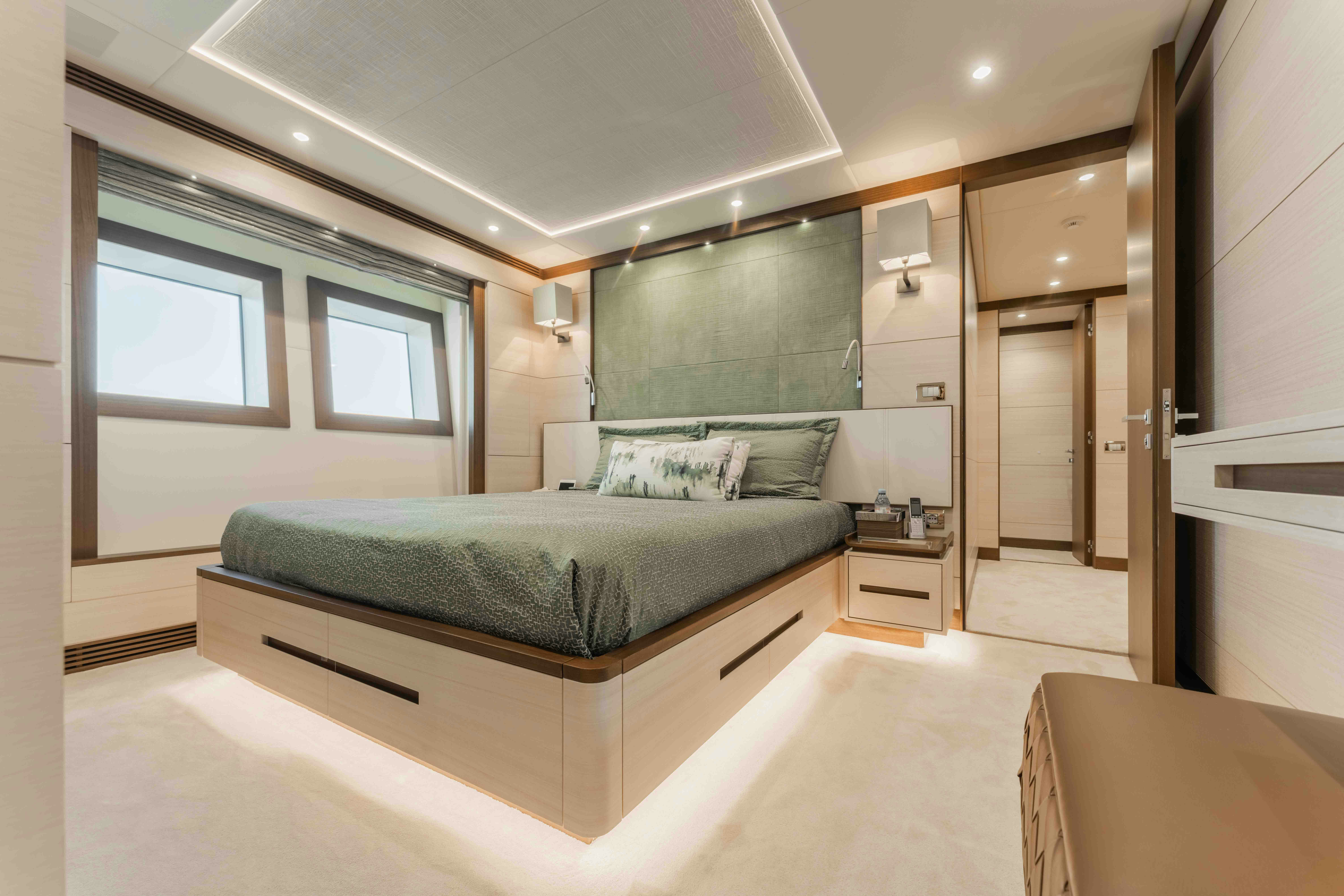 a bed in a room aboard EXINITY Yacht for Sale