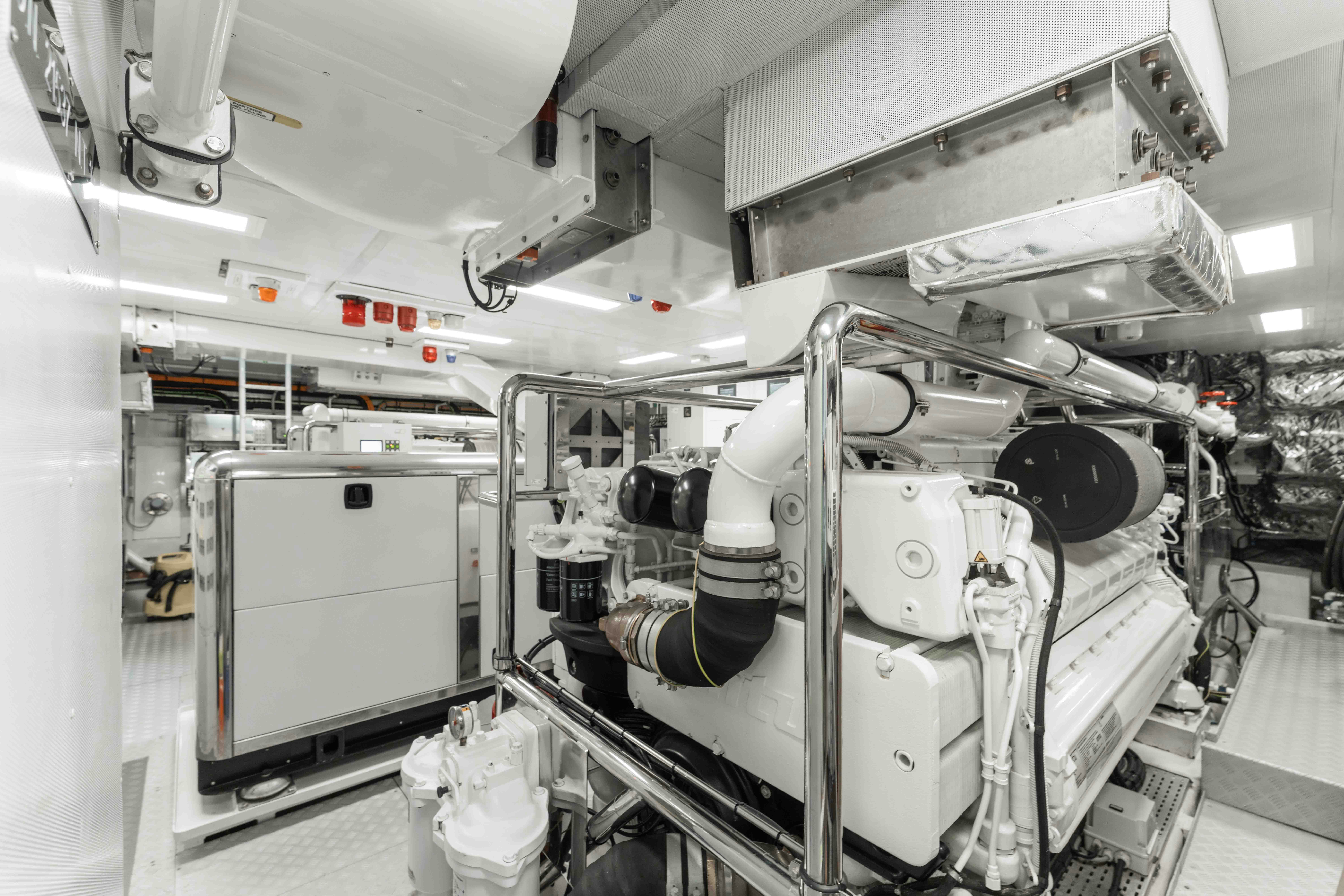 a large machine in a factory aboard EXINITY Yacht for Sale