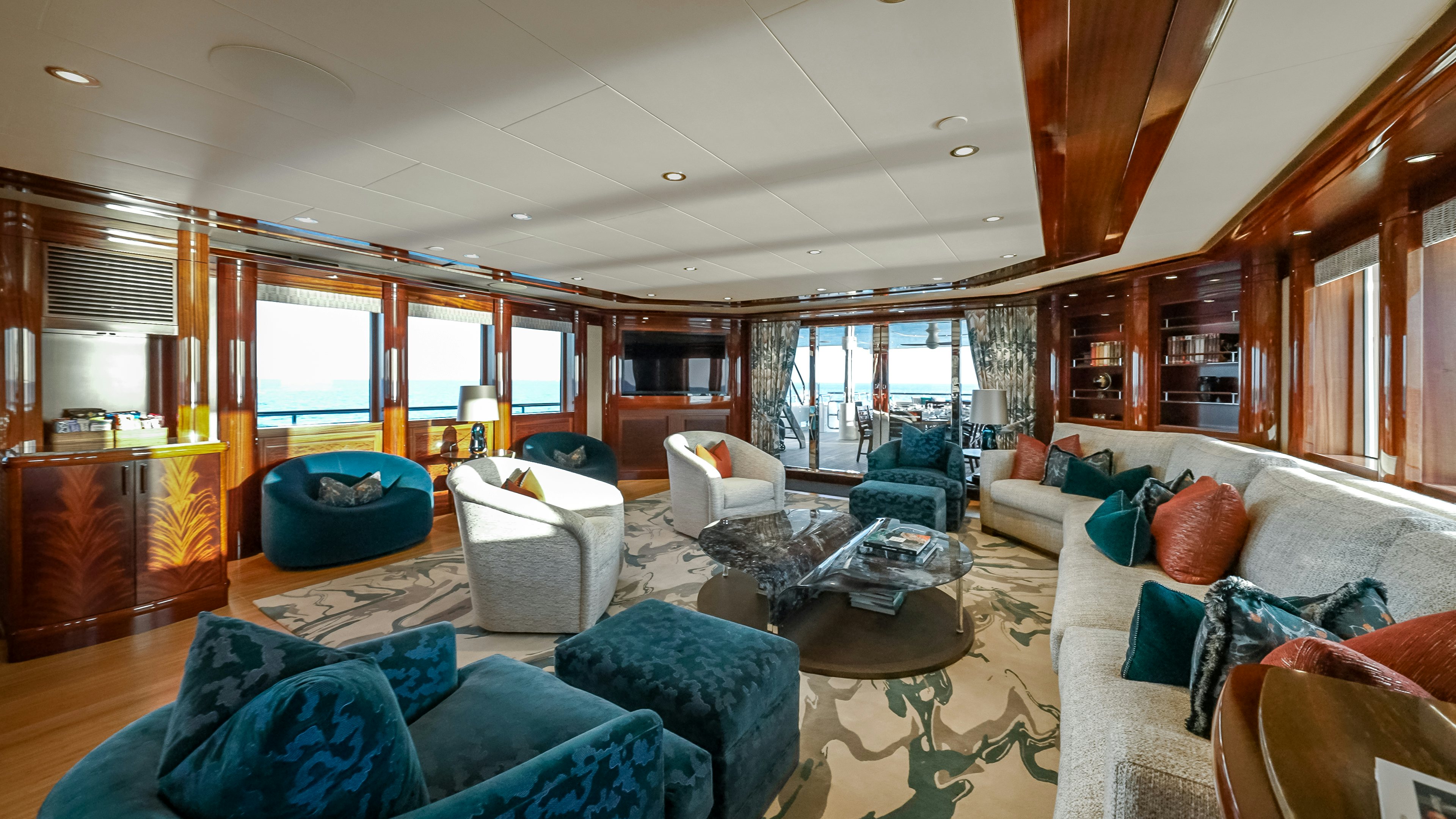 a living room with a large window aboard VALINOR Yacht for Sale