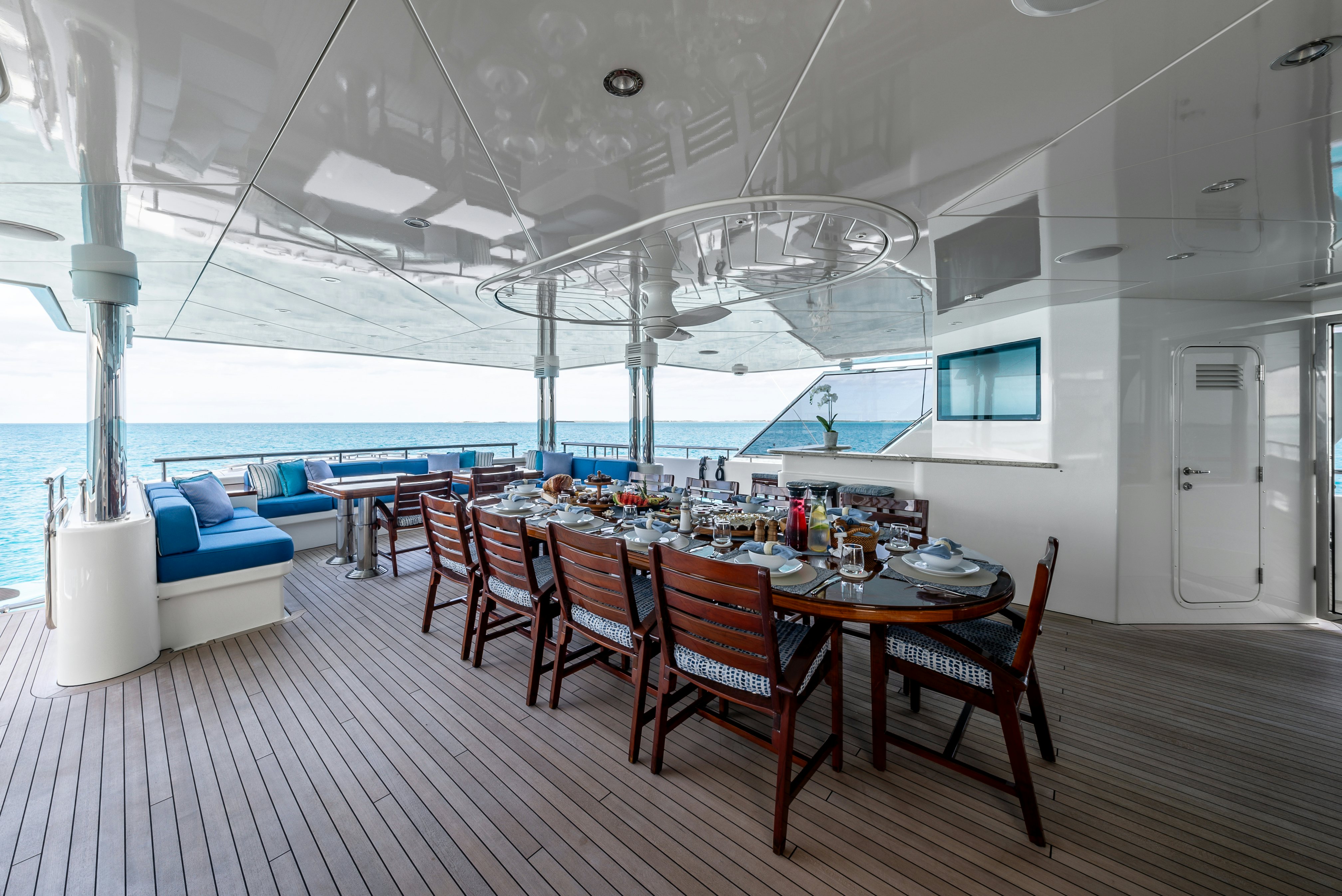 a dining room with a table and chairs aboard VALINOR Yacht for Sale