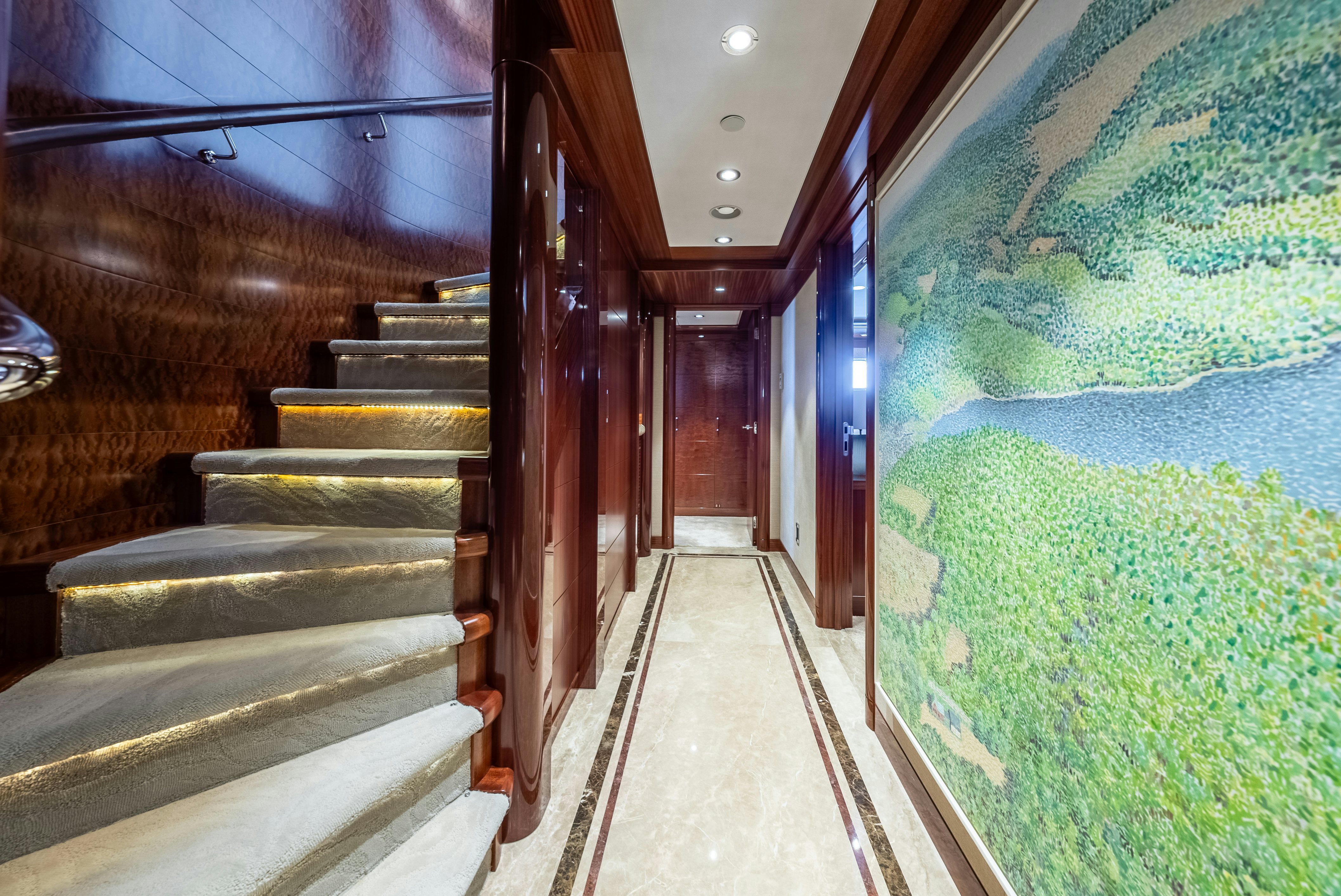 a hallway with stairs and a pool aboard VALINOR Yacht for Sale