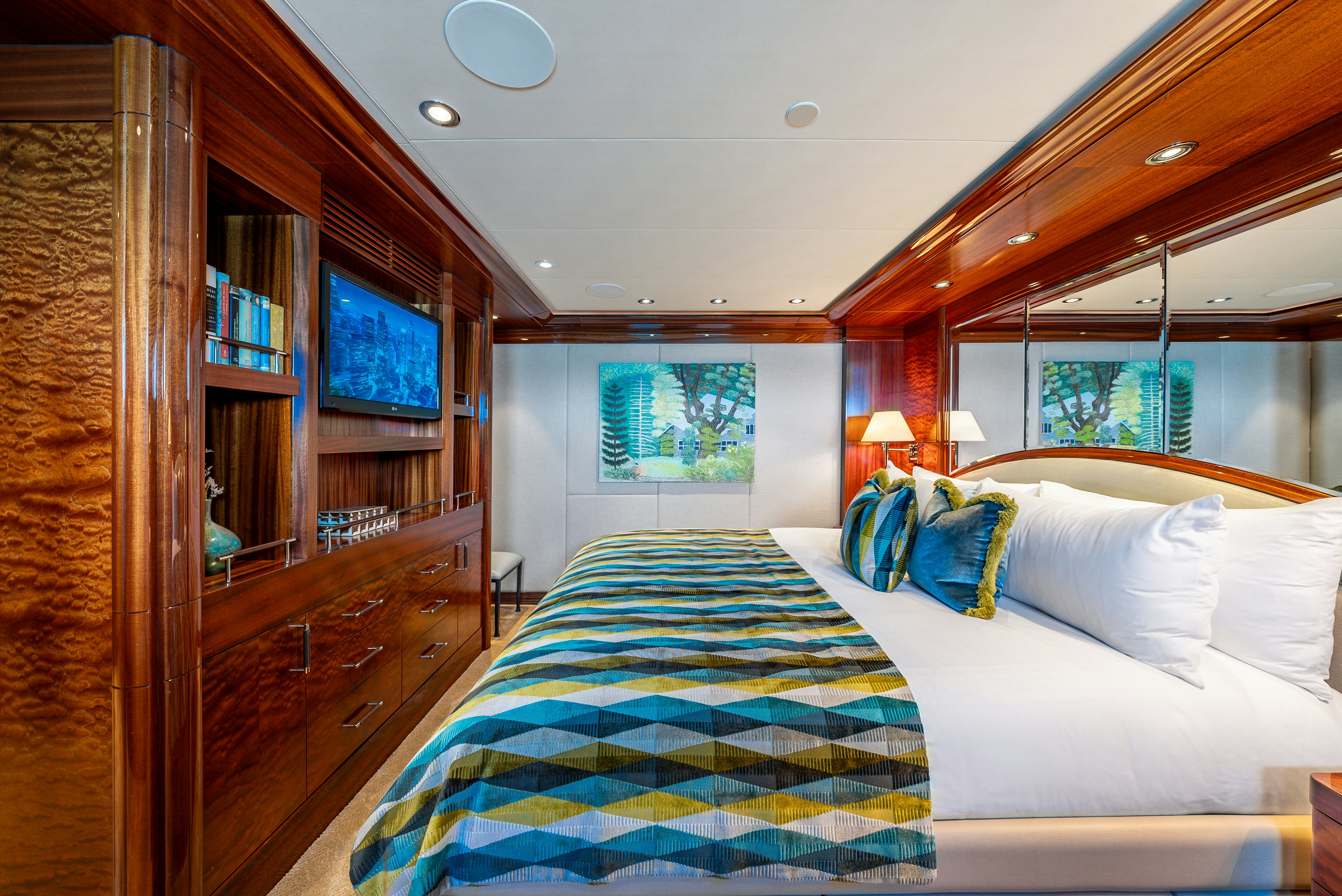 a room with a bed and a desk aboard VALINOR Yacht for Sale