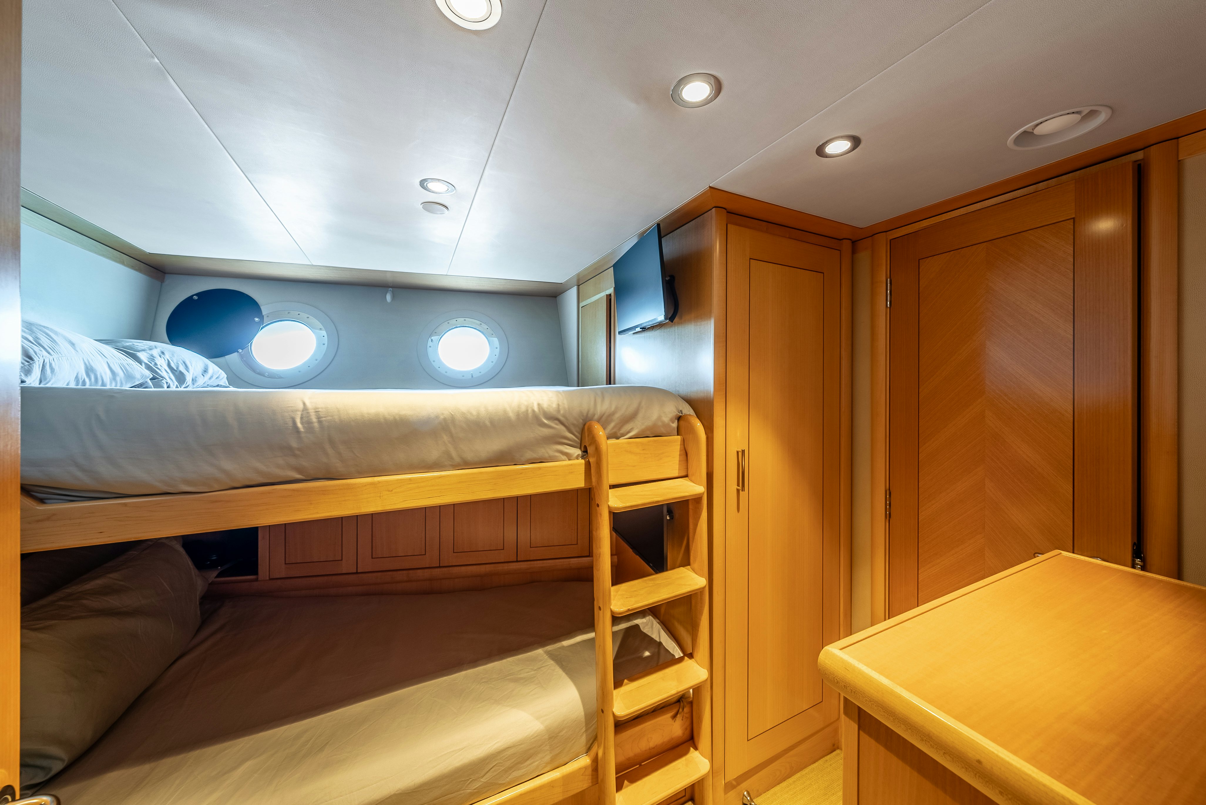 a room with bunk beds aboard VALINOR Yacht for Sale