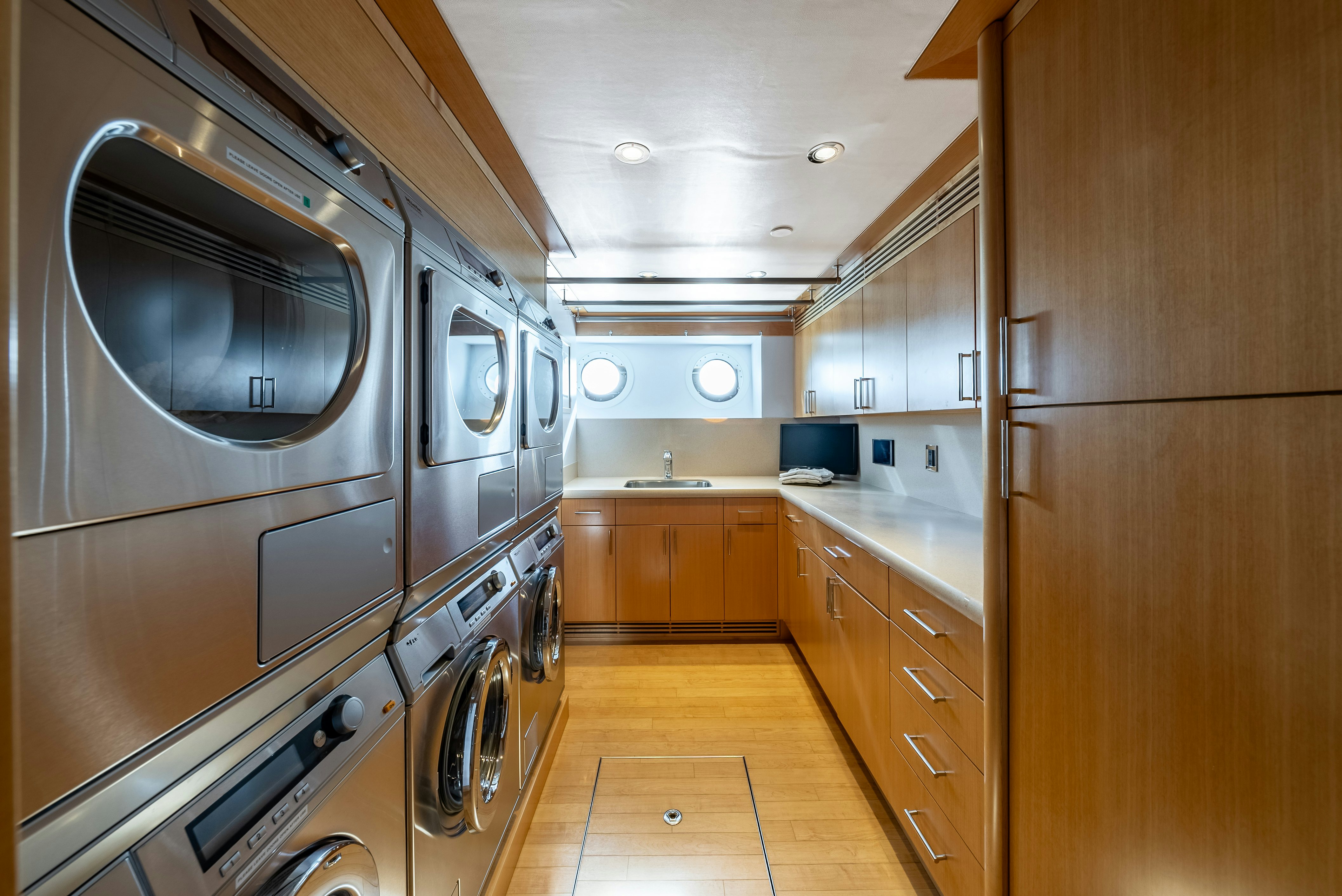 a kitchen with stainless steel appliances aboard VALINOR Yacht for Sale