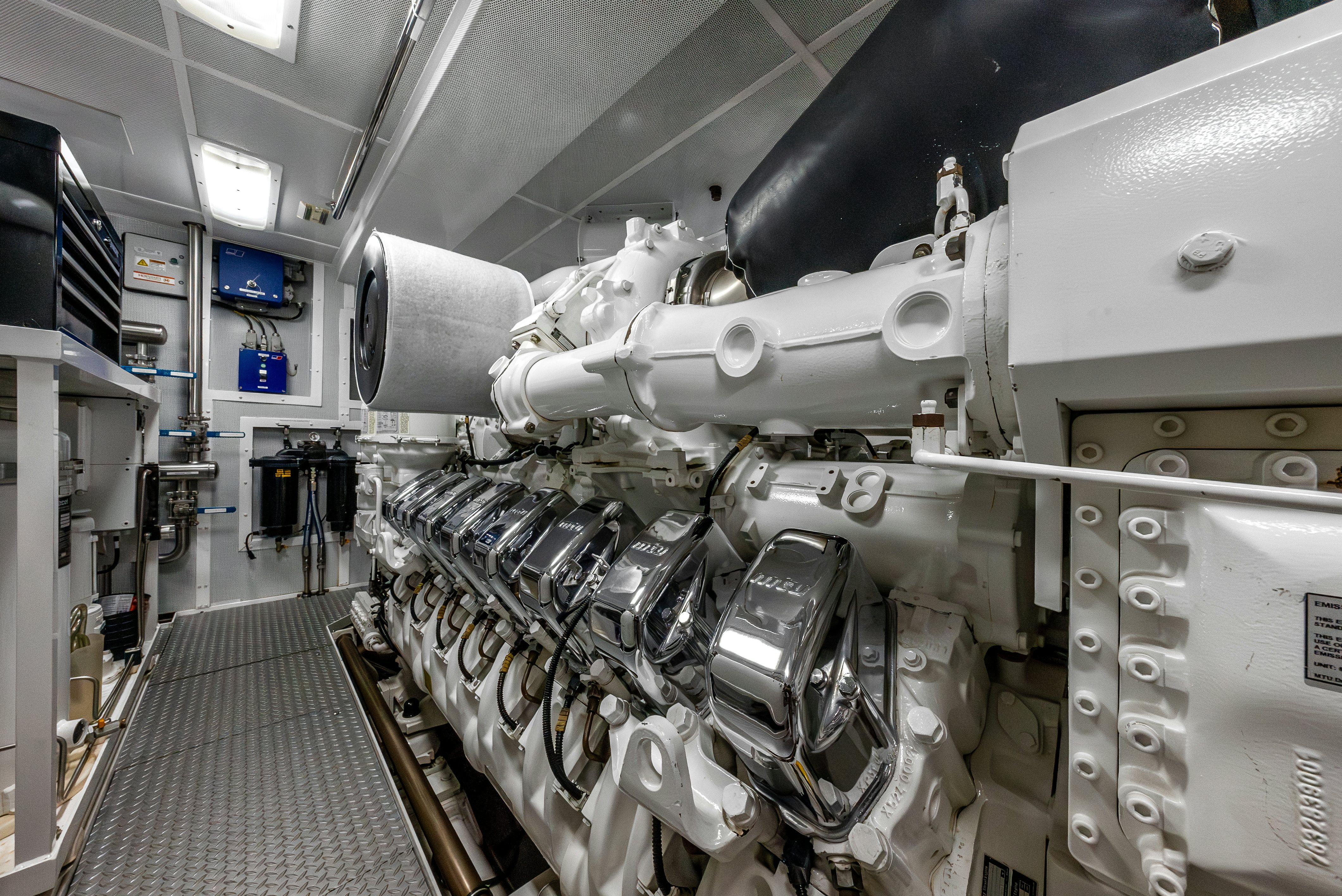 a large machine in a room aboard VALINOR Yacht for Sale