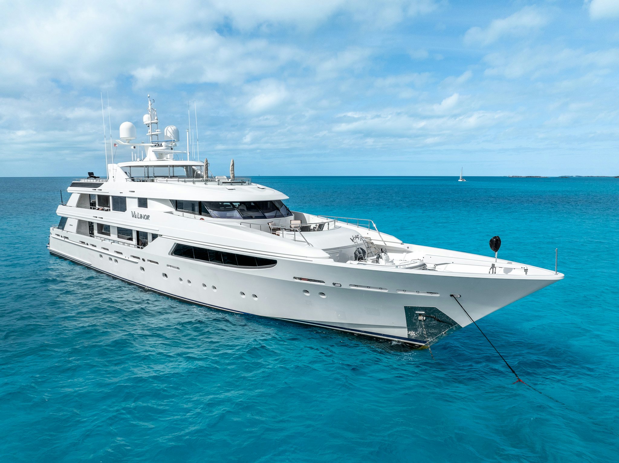 a white yacht in the water aboard VALINOR Yacht for Charter