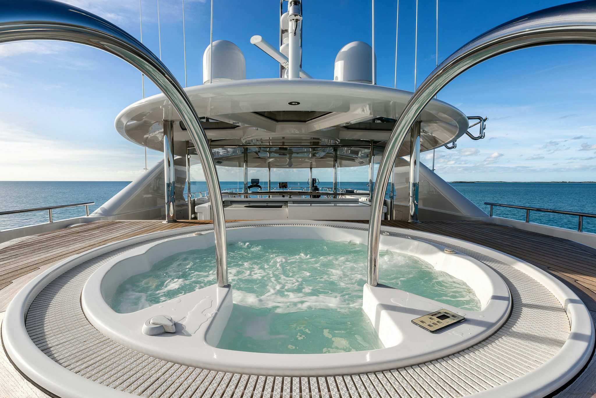 a large pool with a large round object in the middle aboard VALINOR Yacht for Charter