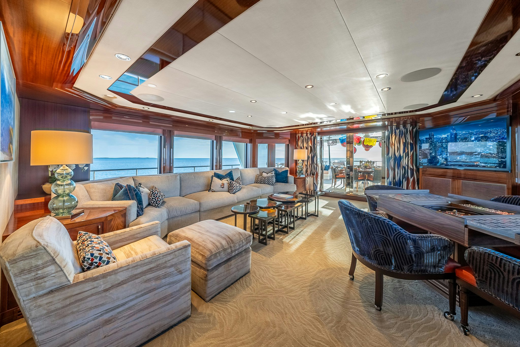 a living room with a large window aboard VALINOR Yacht for Charter