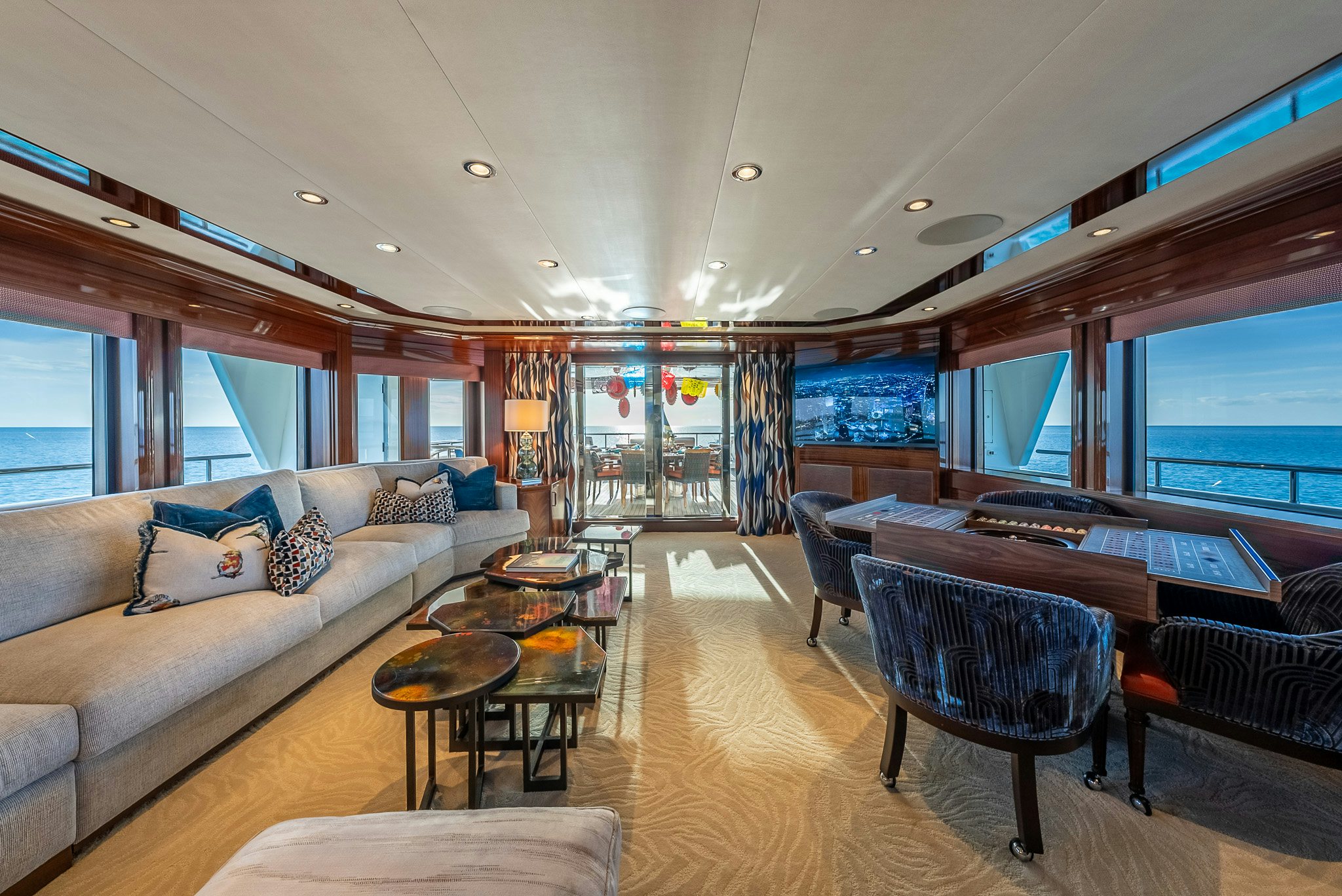 a living room with a large window aboard VALINOR Yacht for Charter