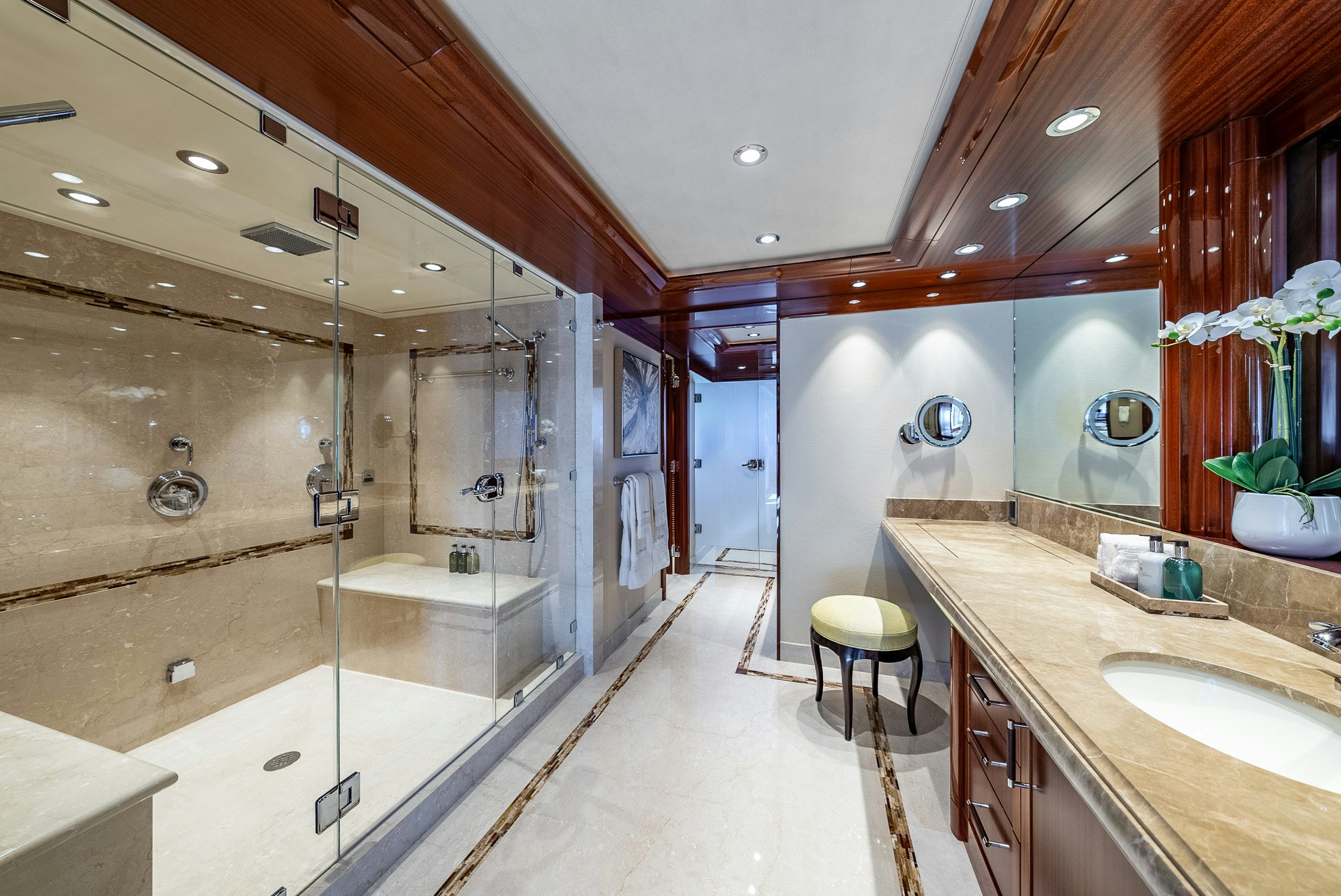 a bathroom with a glass shower aboard VALINOR Yacht for Charter