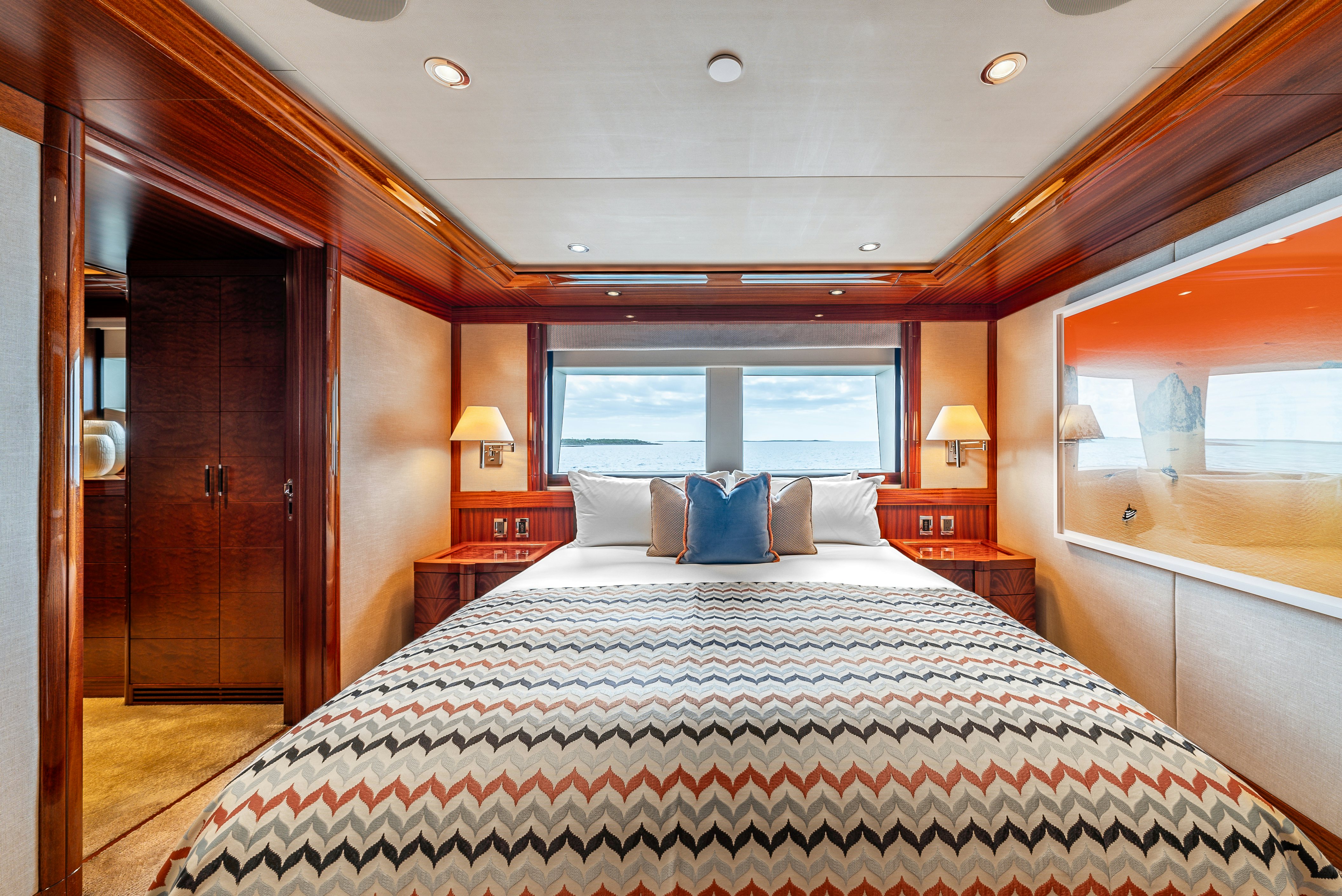 a large bed in a room aboard VALINOR Yacht for Sale