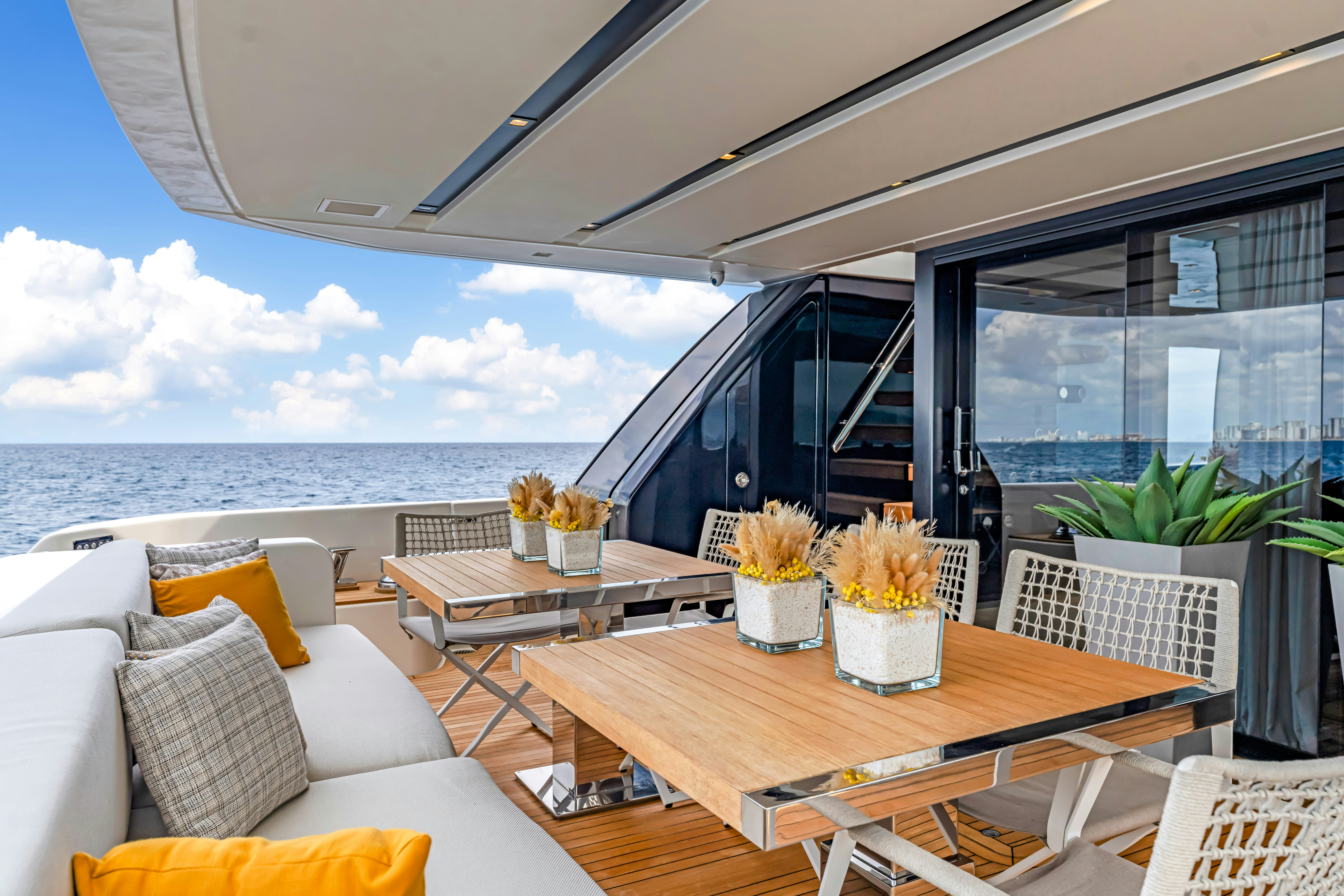 a room with a table and chairs aboard NOTYNOG Yacht for Charter