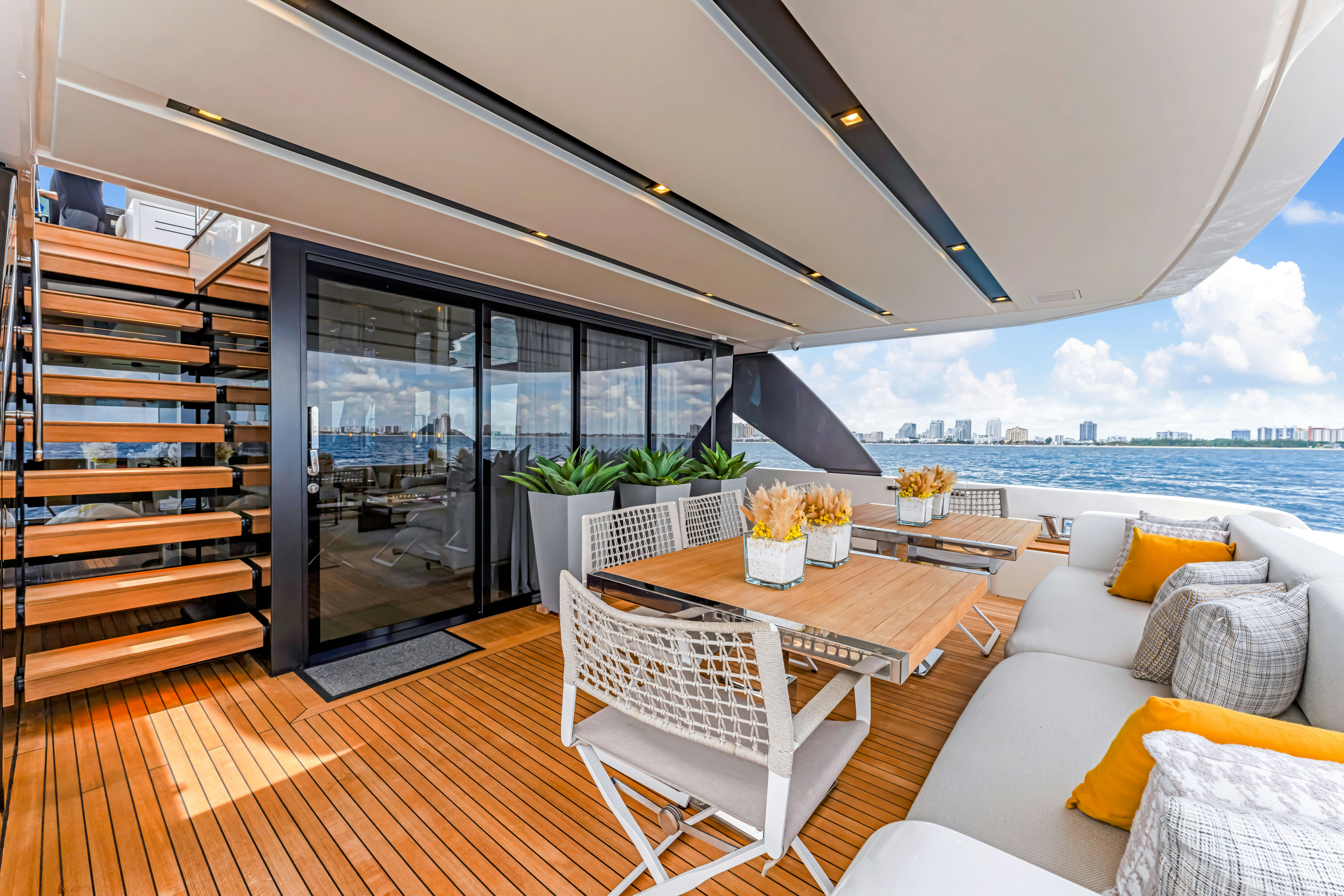 a living room with a large window aboard NOTYNOG Yacht for Charter