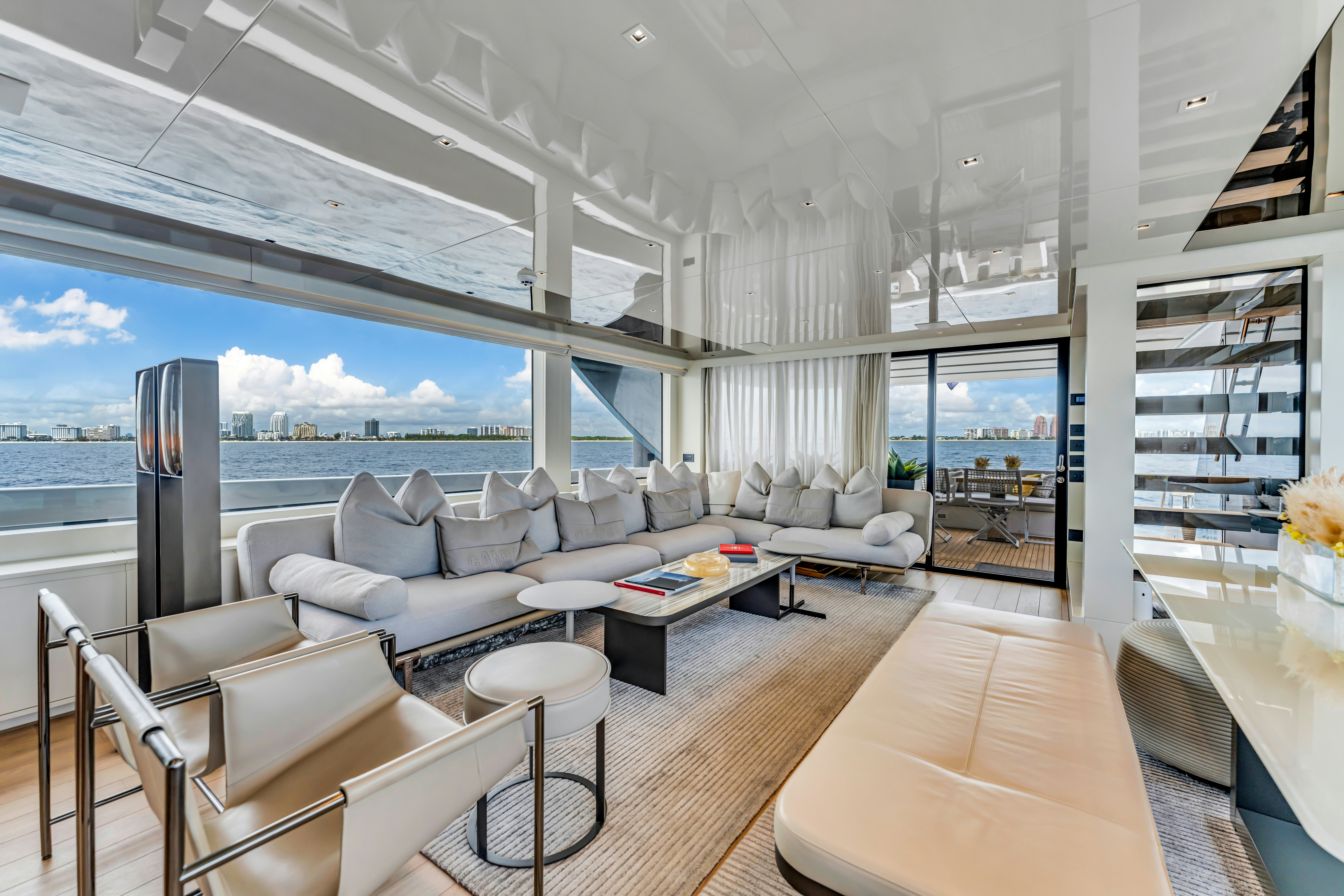 a living room with a large window aboard NOTYNOG Yacht for Charter