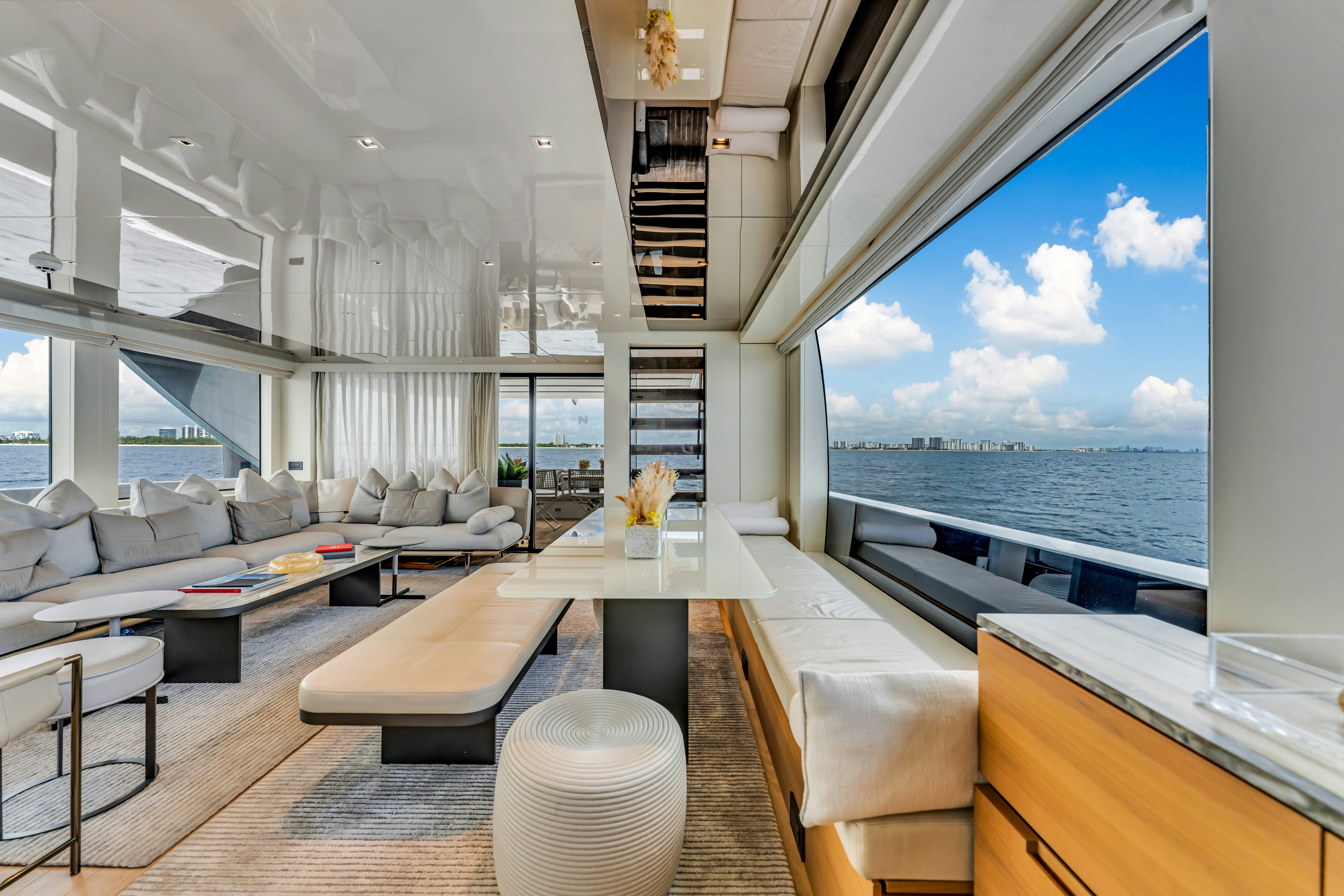 a living room with a large window aboard NOTYNOG Yacht for Charter