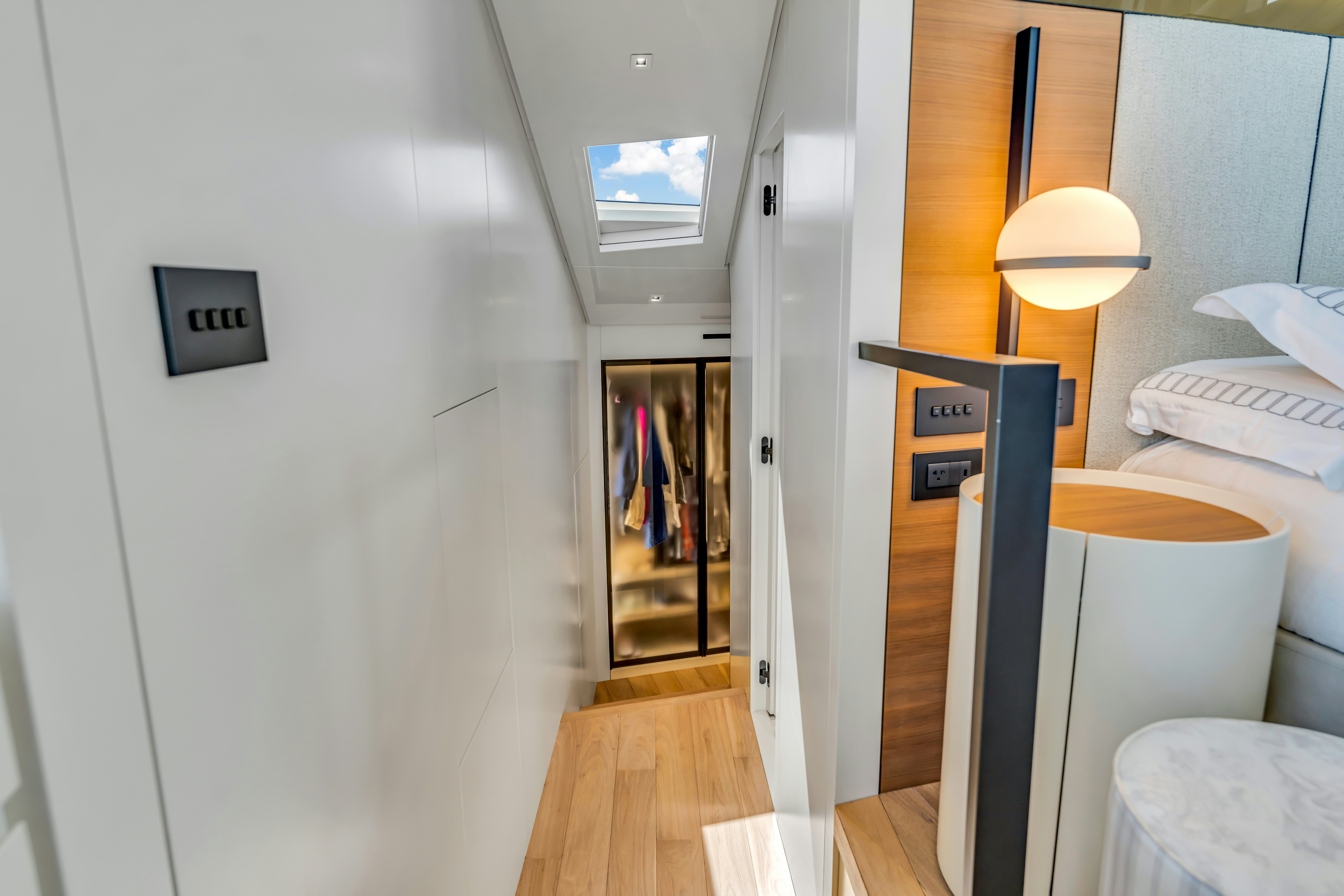 a room with a bed and a desk aboard NOTYNOG Yacht for Charter